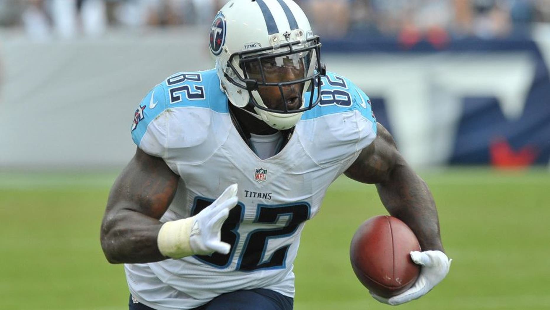 Sep 27, 2015; Nashville, TN, USA; Tennessee Titans tight end Delanie Walker (82) rushes against the Indianapolis Colts during the second half at Nissan Stadium. Indianapolis won 35-33. Mandatory Credit: Jim Brown-USA TODAY Sports