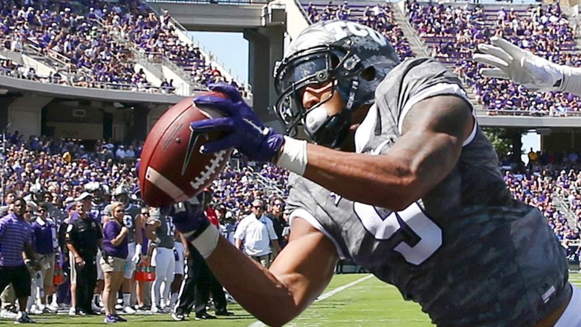 FORT WORTH, TX - SEPTEMBER 12: Josh Doctson #9 of the TCU Horned Frogs fails to hang onto a touch down pass under coverage from Demundre Freeman #26 of the Stephen F. Austin Lumberjacks in the first half at Amon G. Carter Stadium on September 12, 2015 in Fort Worth, Texas. (Photo by Tom Pennington/Getty Images)
