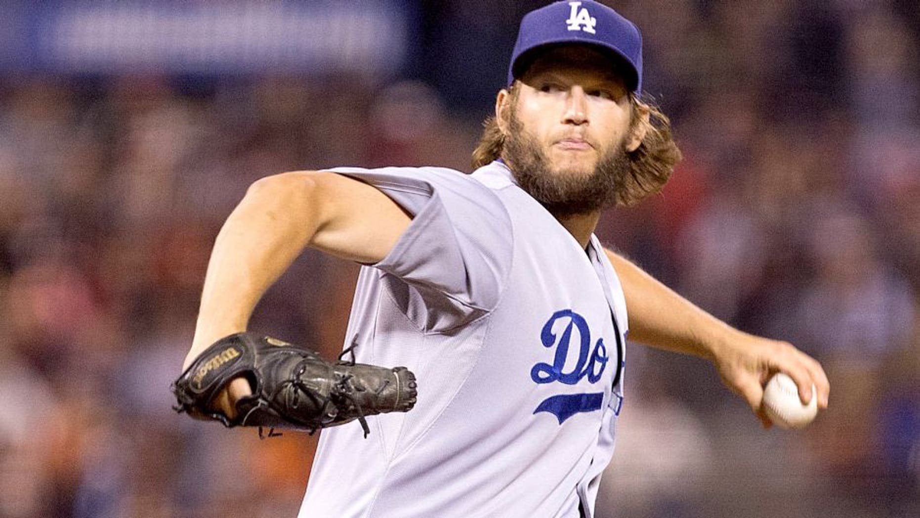 Sep 29, 2015; San Francisco, CA, USA; Los Angeles Dodgers starting pitcher Clayton Kershaw (22) pitches the ball against the San Francisco Giants during the first inning at AT&T Park. Mandatory Credit: Kelley L Cox-USA TODAY Sports