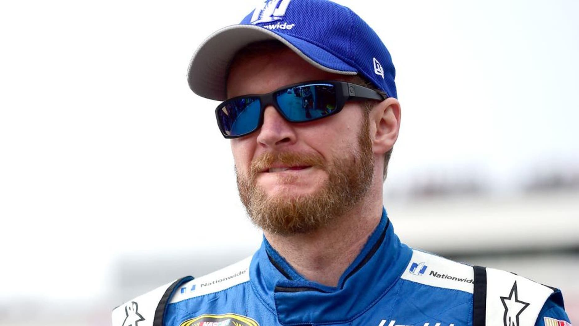 LOUDON, NH - SEPTEMBER 25: Dale Earnhardt Jr., driver of the #88 Nationwide Chevrolet, stands in the garage area during practice for the NASCAR Sprint Cup Series Sylvania 300 at New Hampshire Motor Speedway on September 25, 2015 in Loudon, New Hampshire. (Photo by Jared C. Tilton/Getty Images)