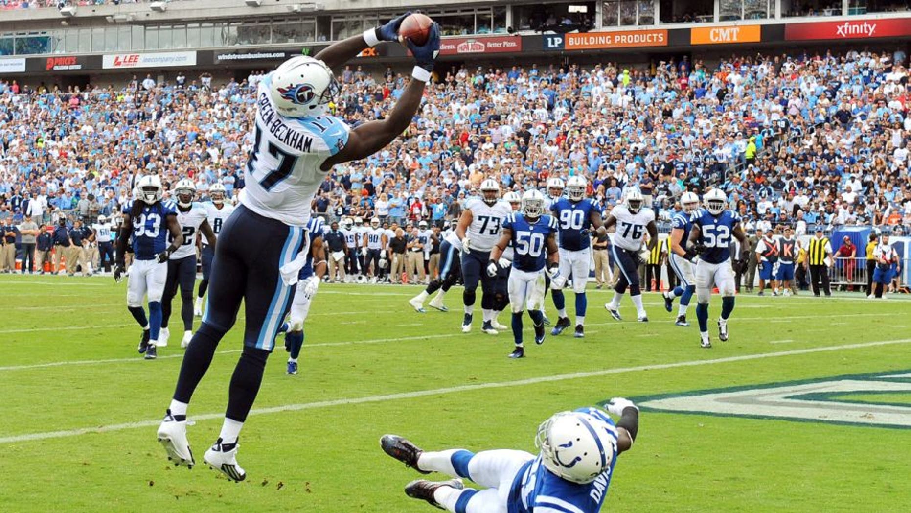 Sep 27, 2015; Nashville, TN, USA; Tennessee Titans receiver Dorial Green-Beckham (17) catches a pass in the end zone during the second half against the Indianapolis Colts at Nissan Stadium. Mandatory Credit: Christopher Hanewinckel-USA TODAY Sports