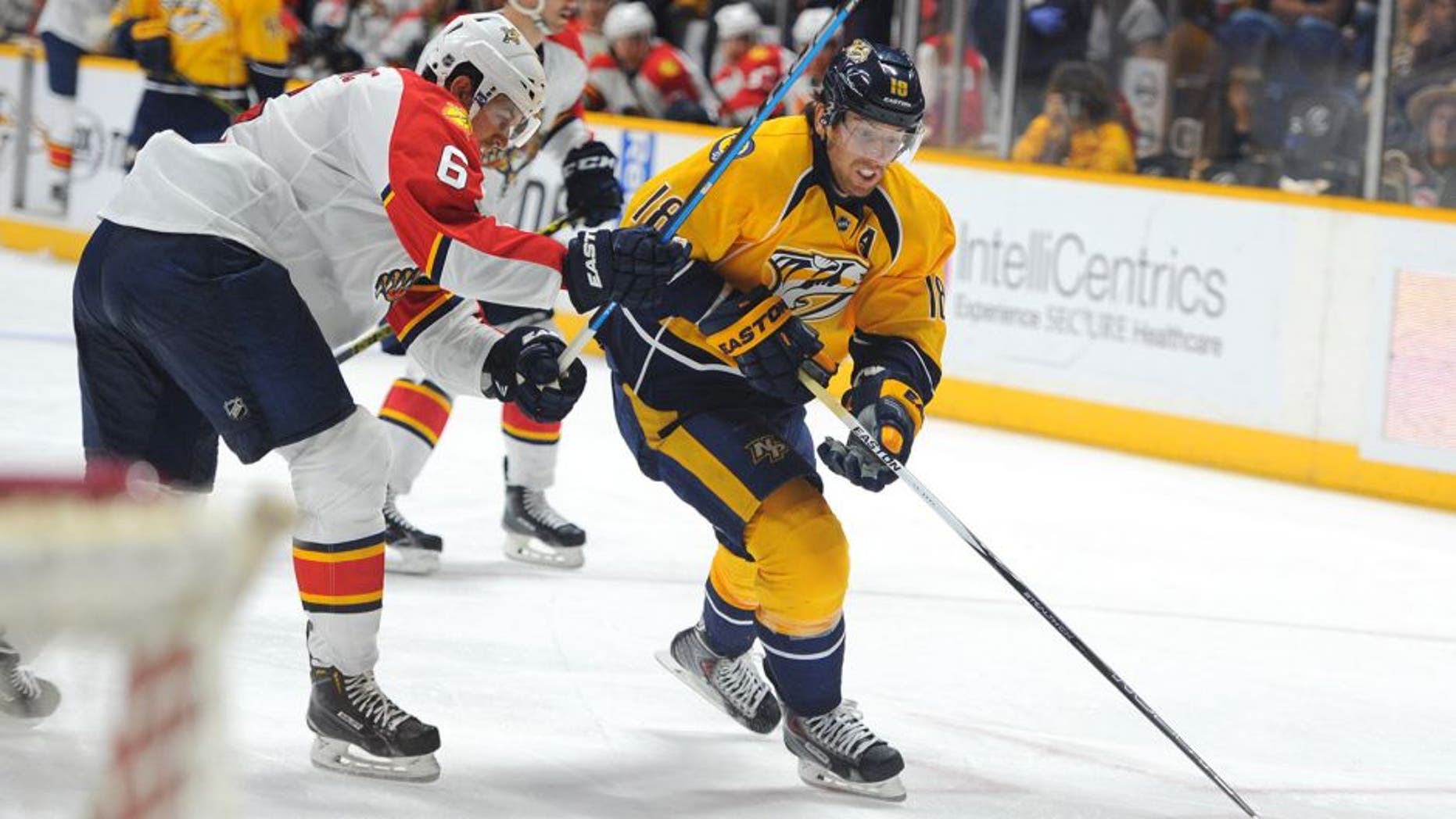 Sep 20, 2015; Nashville, TN, USA; Nashville Predators left winger James Neal (18) skates the puck into the zone during the third period against the Florida Panthers at Bridgestone Arena. Mandatory Credit: Christopher Hanewinckel-USA TODAY Sports