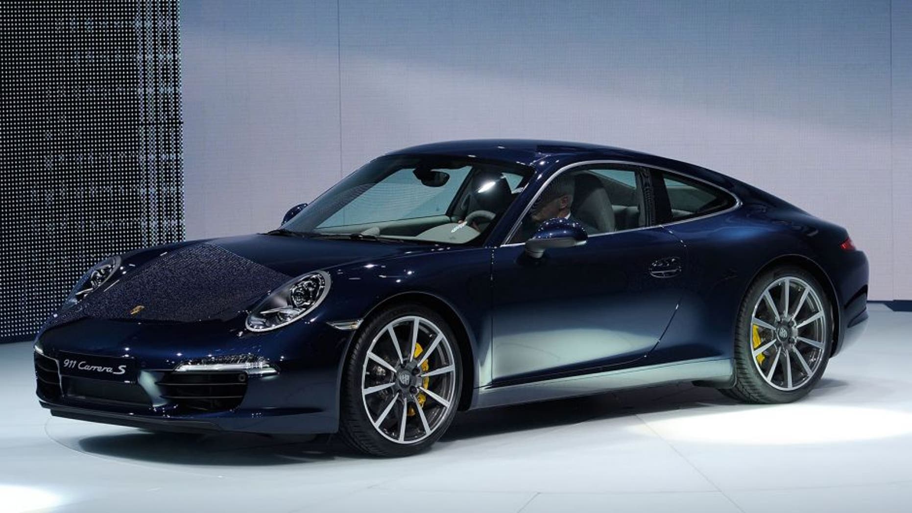 FRANKFURT AM MAIN, GERMANY - SEPTEMBER 13: Porsche presents the new Porsche 911 during the press days at the IAA Frankfurt Auto Show on September 13, 2011 in Frankfurt am Main, Germany. The IAA will be open to the public from September 17 through September 25.(Photo by Thorsten Wagner/Getty Images)