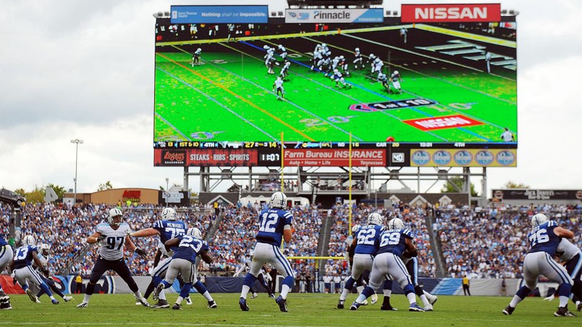 Sep 27, 2015; Nashville, TN, USA; Indianapolis Colts quarterback Andrew Luck (12) drops back to pass during the second half against the Tennessee Titans at Nissan Stadium. The Colts won 35-33. Mandatory Credit: Christopher Hanewinckel-USA TODAY Sports