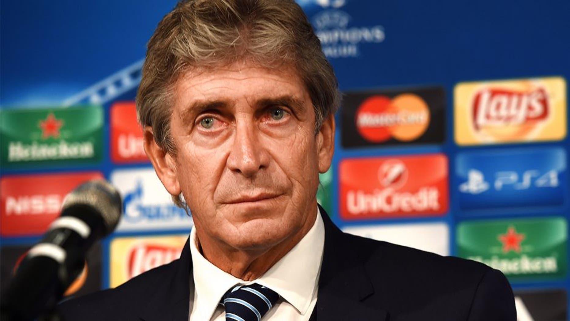 Manchesterôs Chilean head coach Manuel Pellegrini attends a press conference on the eve of the Group D, first-leg UEFA Champions League football match Borussia Moenchengladbach vs Manchester City FC in Moenchengladbach, western Germany on September 29, 2015. AFP PHOTO / PATRIK STOLLARZ (Photo credit should read PATRIK STOLLARZ/AFP/Getty Images)