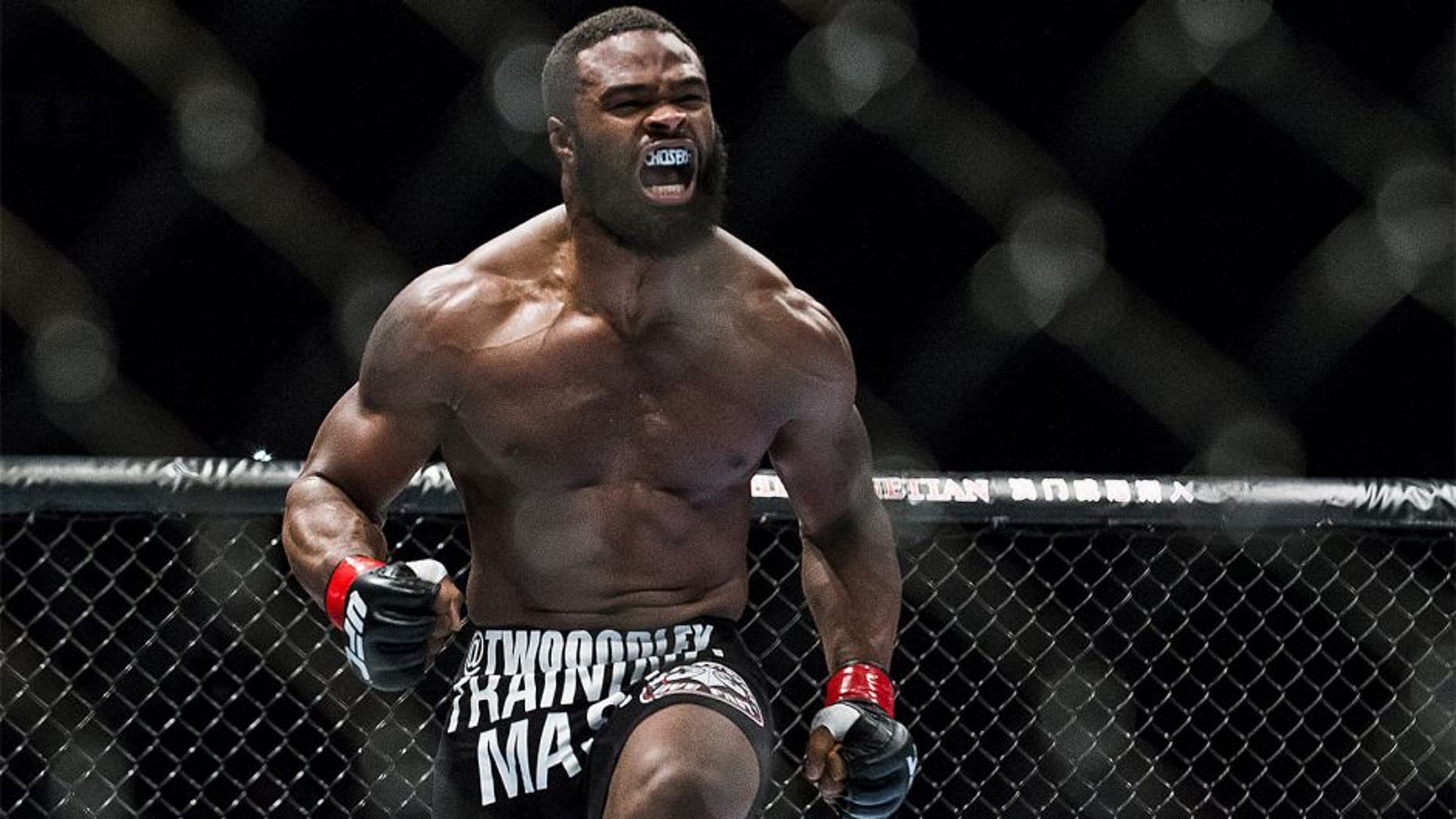 MACAU - AUGUST 23: Tyron Woodley of USA celebrates after winning his welterweight fight against Dong Hyun Kim of South Korea during the UFC Fight Night at The Venetian Macao Cotai Arena on August 23, 2014 in Macau, China. (Photo by Victor Fraile/Getty Images)