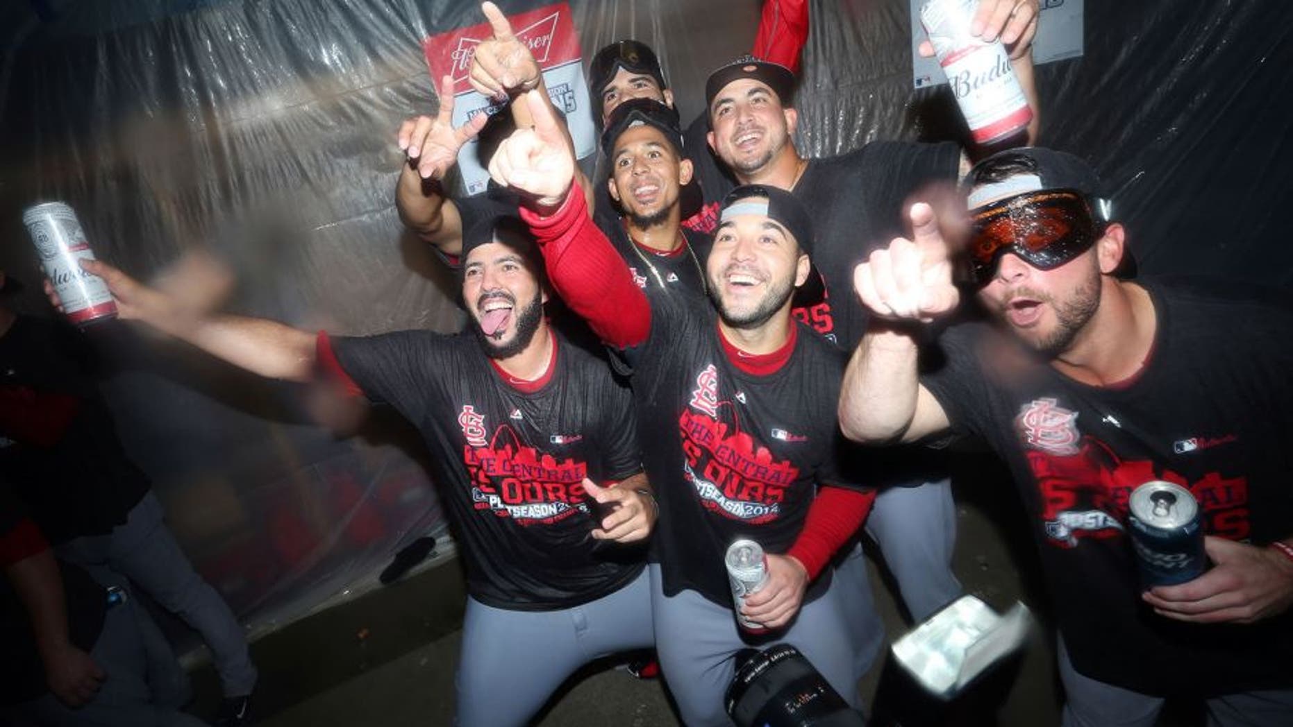 Sep 30, 2015; Pittsburgh, PA, USA; St. Louis Cardinals players pose for a photo after defeating the Pittsburgh Pirates to clinch the National League Central Division Championship at PNC Park. The Cardinals won 11-1. Mandatory Credit: Charles LeClaire-USA TODAY Sports