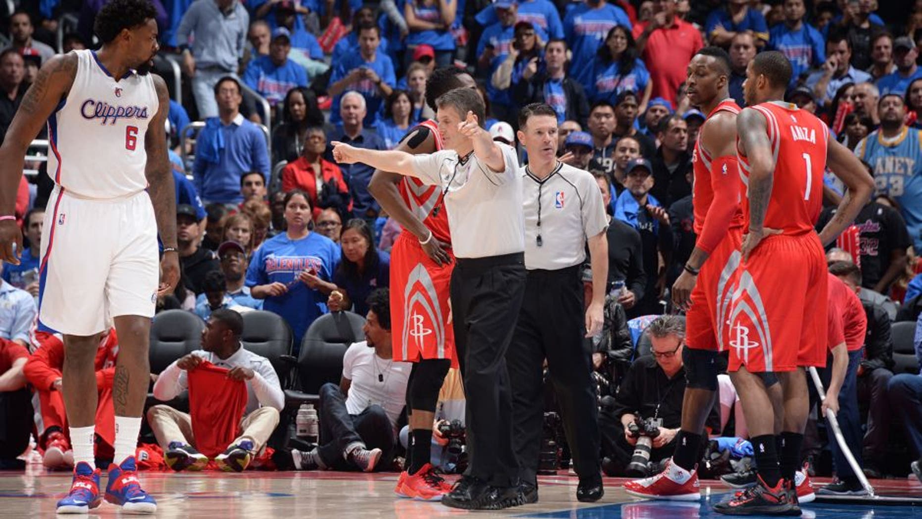 LOS ANGELES, CA - MAY 14: Referee Scott Foster signals for a replay in Game Six of the Western Conference Semifinals between the Los Angeles Clippers and the Houston Rockets during the 2015 NBA Playoffs on May 14, 2015 at Staples Center in Los Angeles, California. NOTE TO USER: User expressly acknowledges and agrees that, by downloading and or using this Photograph, user is consenting to the terms and conditions of the Getty Images License Agreement. Mandatory Copyright Notice: Copyright 2015 NBAE (Photo by Andrew D. Bernstein/NBAE via Getty Images)