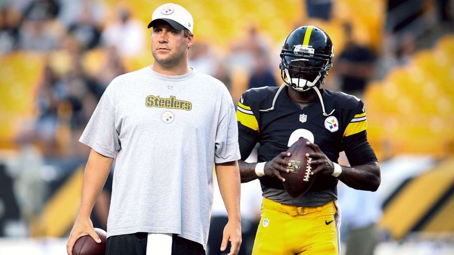 Sep 3, 2015; Pittsburgh, PA, USA; Pittsburgh Steelers quarterbacks Ben Roethlisberger (L) and Michael Vick (R) (2) on the field before playing the Carolina Panthers at Heinz Field. Mandatory Credit: Charles LeClaire-USA TODAY Sports