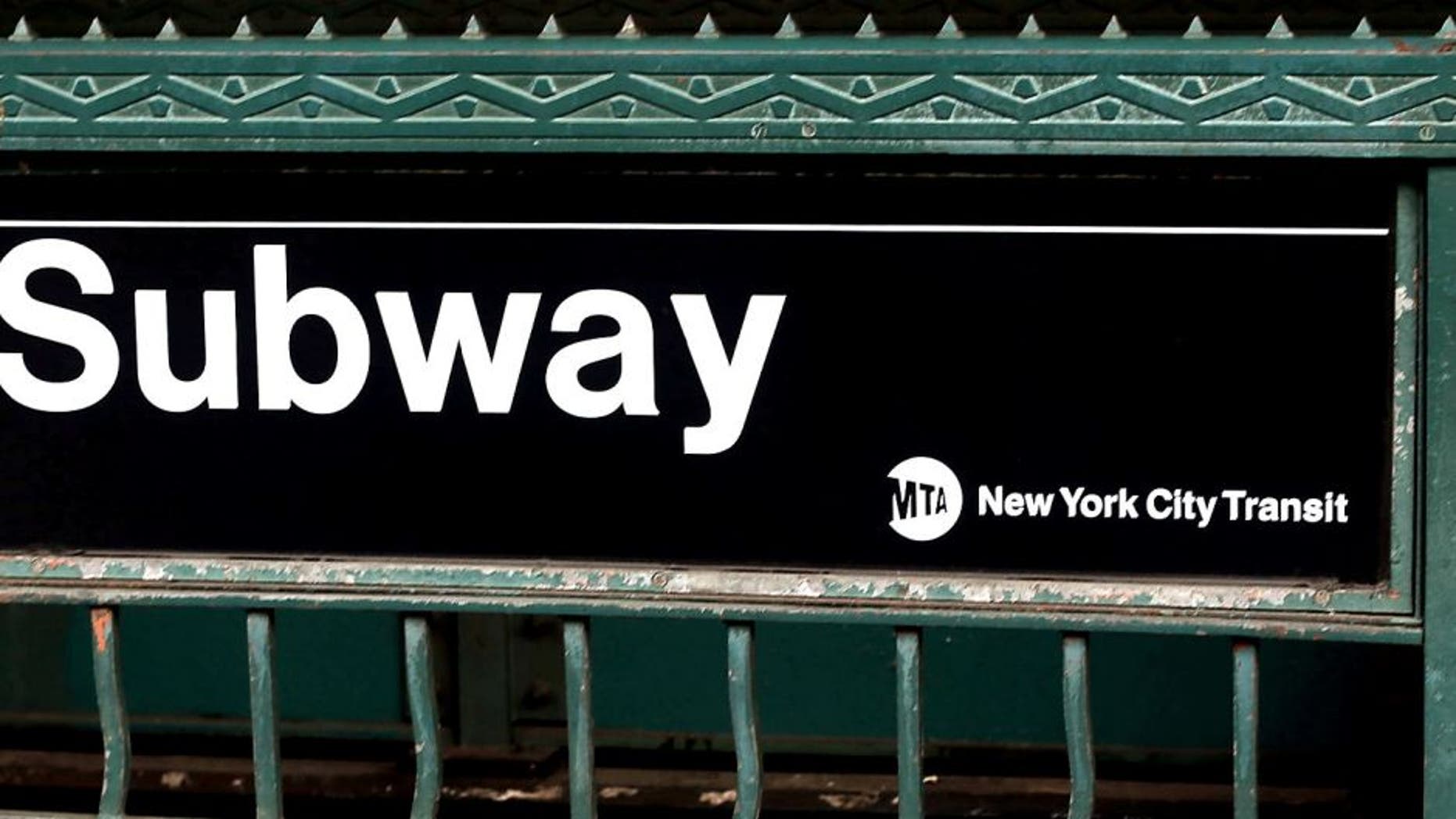 NEW YORK, NY - DECEMBER 05: People exit a subway stop in Manhattan two days after a man was pushed to his death in front of a train on December 5, 2012 in New York City. The incident was caught by a photographer and has since raised questions as to why someone didn't help the man before the train struck him. The New York City subway system, with 468 stations in operation, is the most extensive public transportation system in the world. It is also one of the world's oldest public transit systems, with the first underground line of the subway opening on October 27, 1904. (Photo by Spencer Platt/Getty Images)