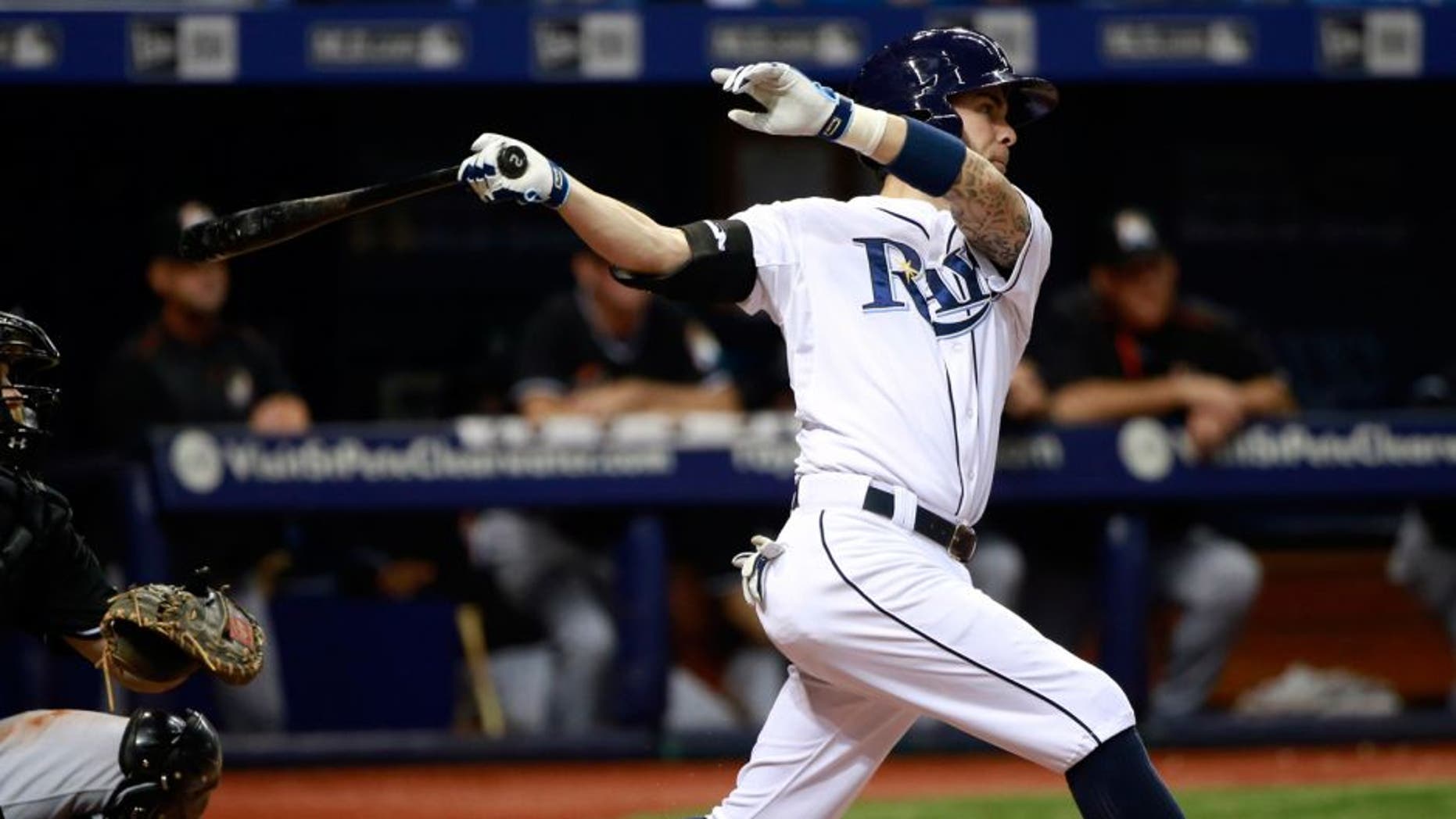 Sep 30, 2015; St. Petersburg, FL, USA; Tampa Bay Rays second baseman Nick Franklin (2) hits a home run during the fifth inning against the Miami Marlins at Tropicana Field. Mandatory Credit: Kim Klement-USA TODAY Sports