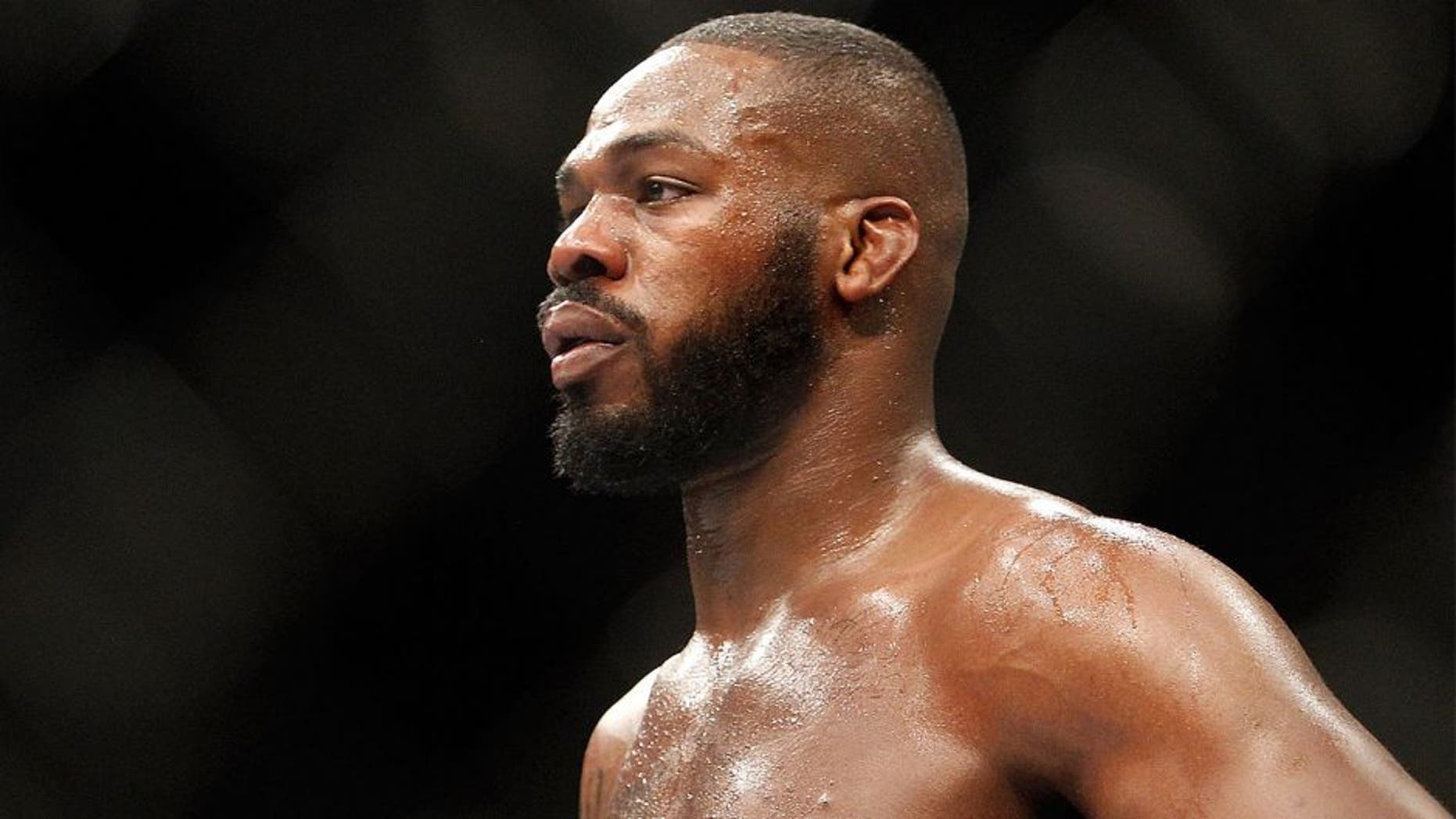 LAS VEGAS, NV - JANUARY 03: Light heavyweight champion Jon Jones waits in a timeout as he defends his title against Daniel Cormier during the UFC 182 event at the MGM Grand Garden Arena on January 3, 2015 in Las Vegas, Nevada. Jones retained his title by unanimous decision. (Photo by Steve Marcus/Getty Images)