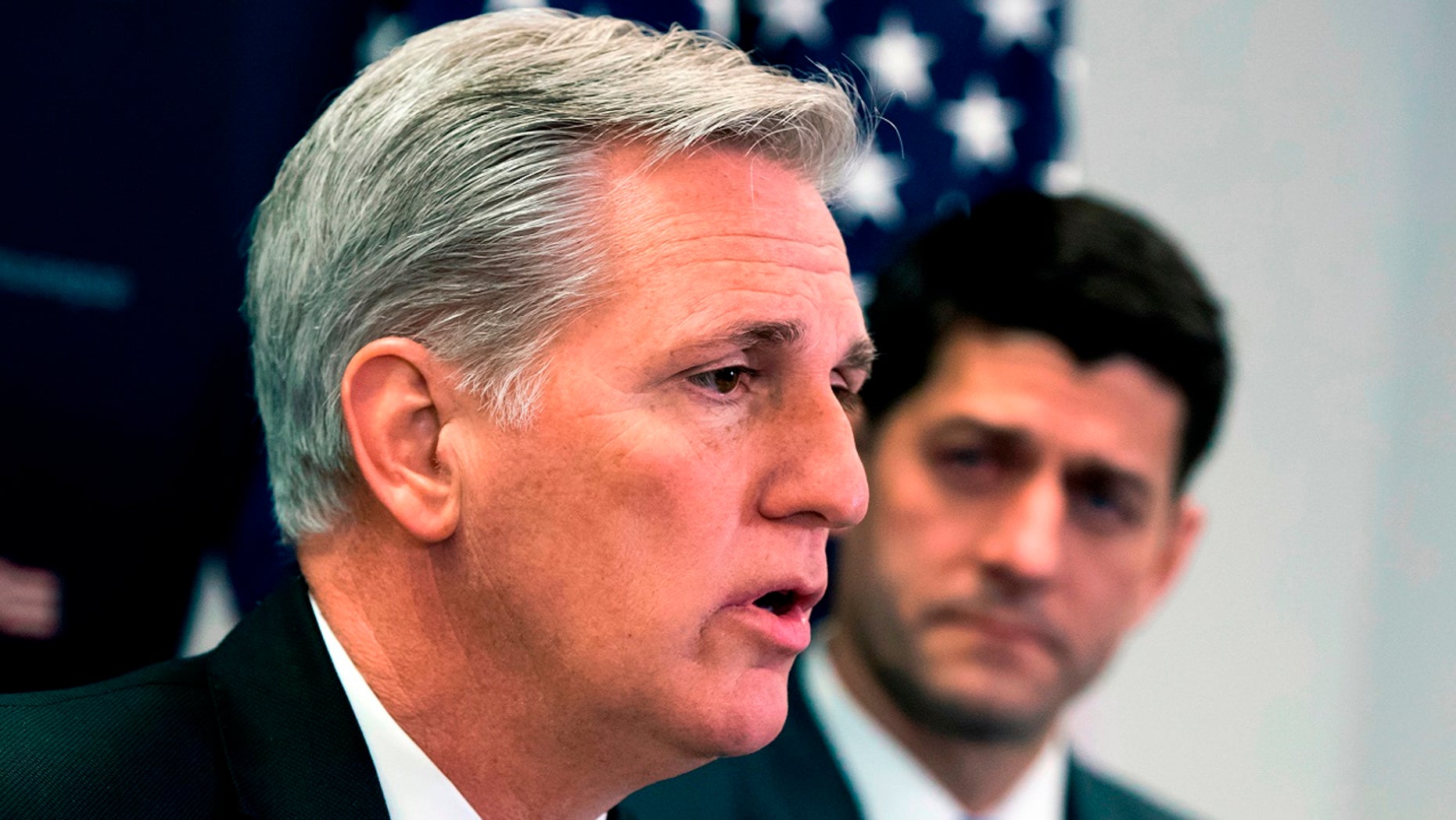 House Majority Leader Kevin McCarthy, R-Calif., joined at right by Speaker of the House Paul Ryan, R-Wis., talks with reporters at the Capitol in Washington, Feb. 6, 2018.