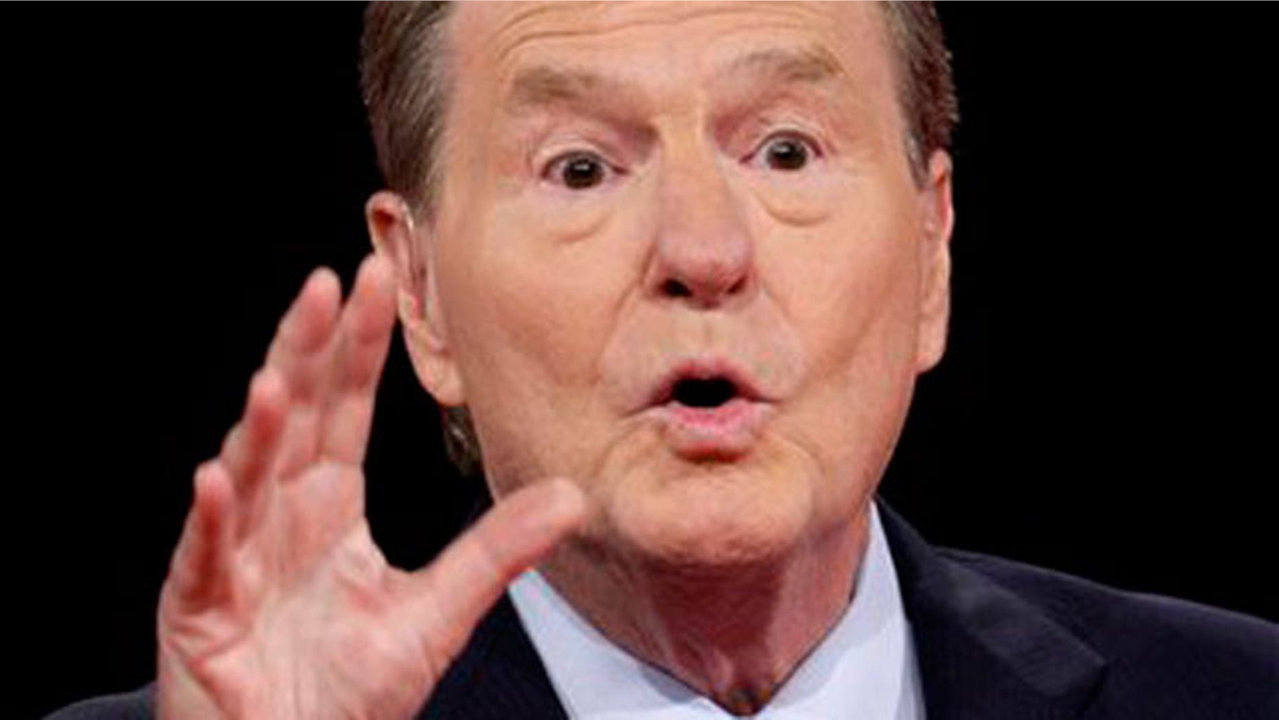 n this Sept. 26, 2008 file photo, PBS anchor Jim Lehrer discusses the rules of the debate with the audience prior to the start of the presidential debate, at the University of Mississippi in Oxford, Miss. (AP)