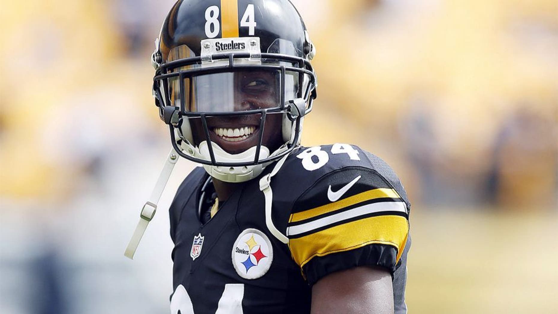 Sep 28, 2014; Pittsburgh, PA, USA; Pittsburgh Steelers wide receiver Antonio Brown (84) smiles on the field before playing the Tampa Bay Buccaneers at Heinz Field. Mandatory Credit: Charles LeClaire-USA TODAY Sports
