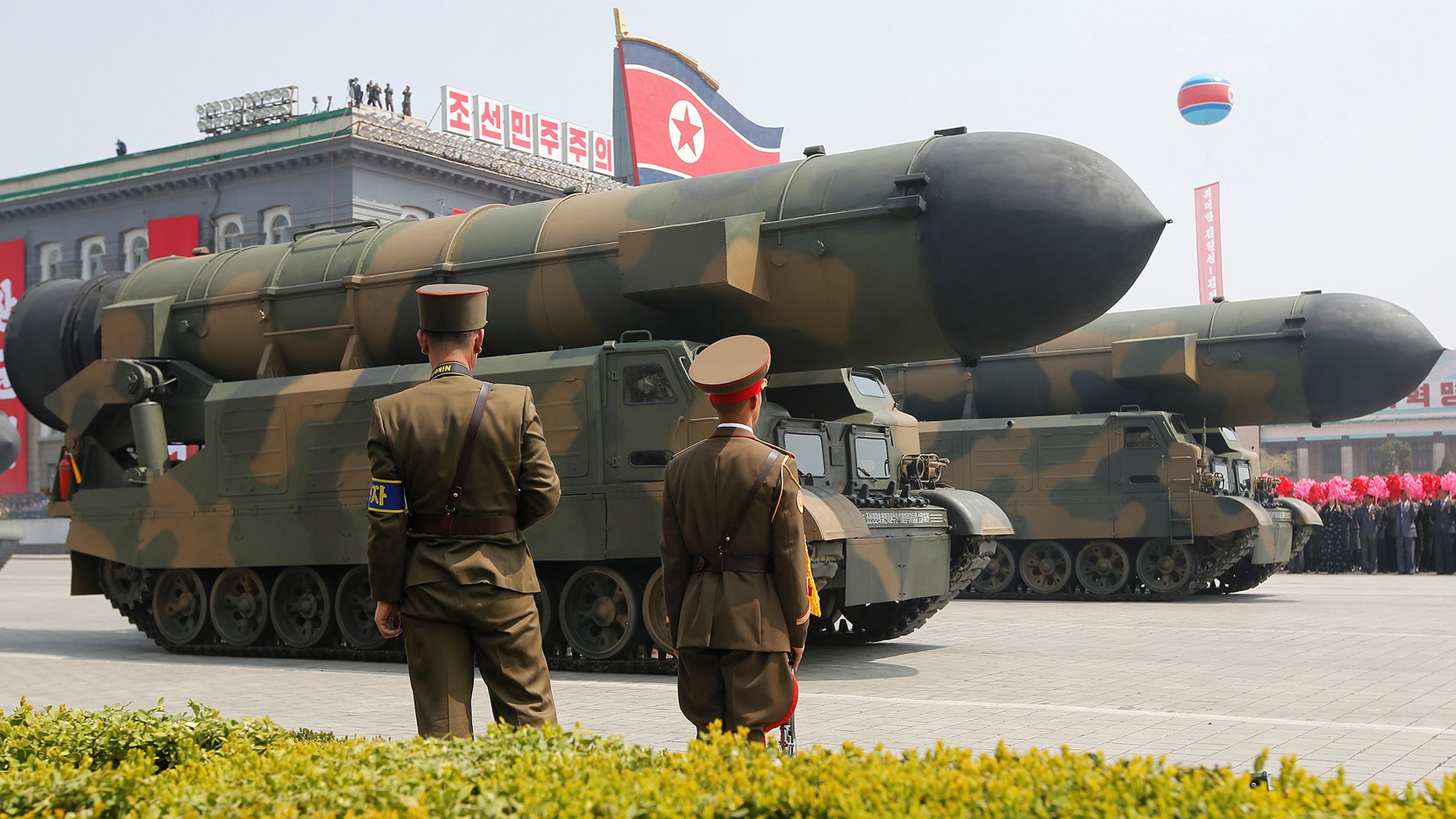 Missiles are driven past the stand with North Korean leader Kim Jong Un and other high ranking officials during a military parade marking the 105th birth anniversary of North Korea's founding father, Kim Il Sung, in Pyongyang, April 15, 2017. REUTERS/Sue-Lin Wong - RTS12FMN