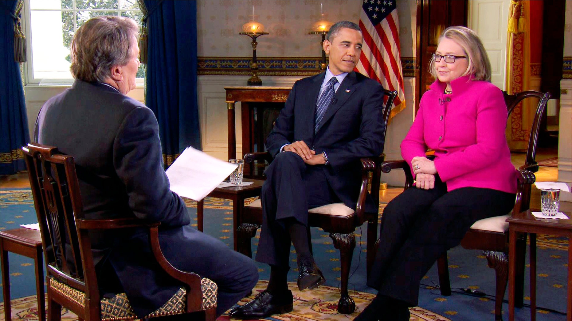 Jan. 25, 2013: File image taken from video and provided by CBS, President Barack Obama, center, and Secretary of State Hillary Rodham Clinton speak with 60 Minutes correspondent Steve Kroft, left, in the Blue Room of the White House in Washington.