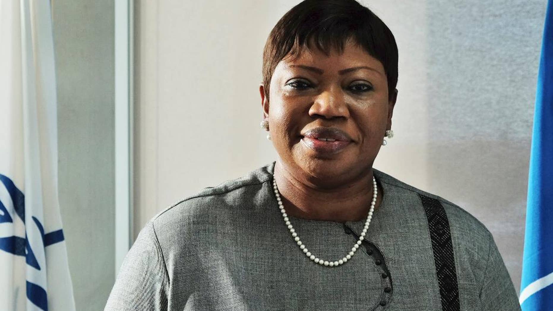 The International Criminal Court's prosecutor Fatou Bensouda poses for a picture during an interview in The Hague, Netherlands, Tuesday, Nov. 22, 2016. Bensouda says it is a "regression" for African nations, including her own home country of Gambia, to quit the court and says the continent should work together with her office to end impunity for atrocities. (AP Photo/Mike Corder)