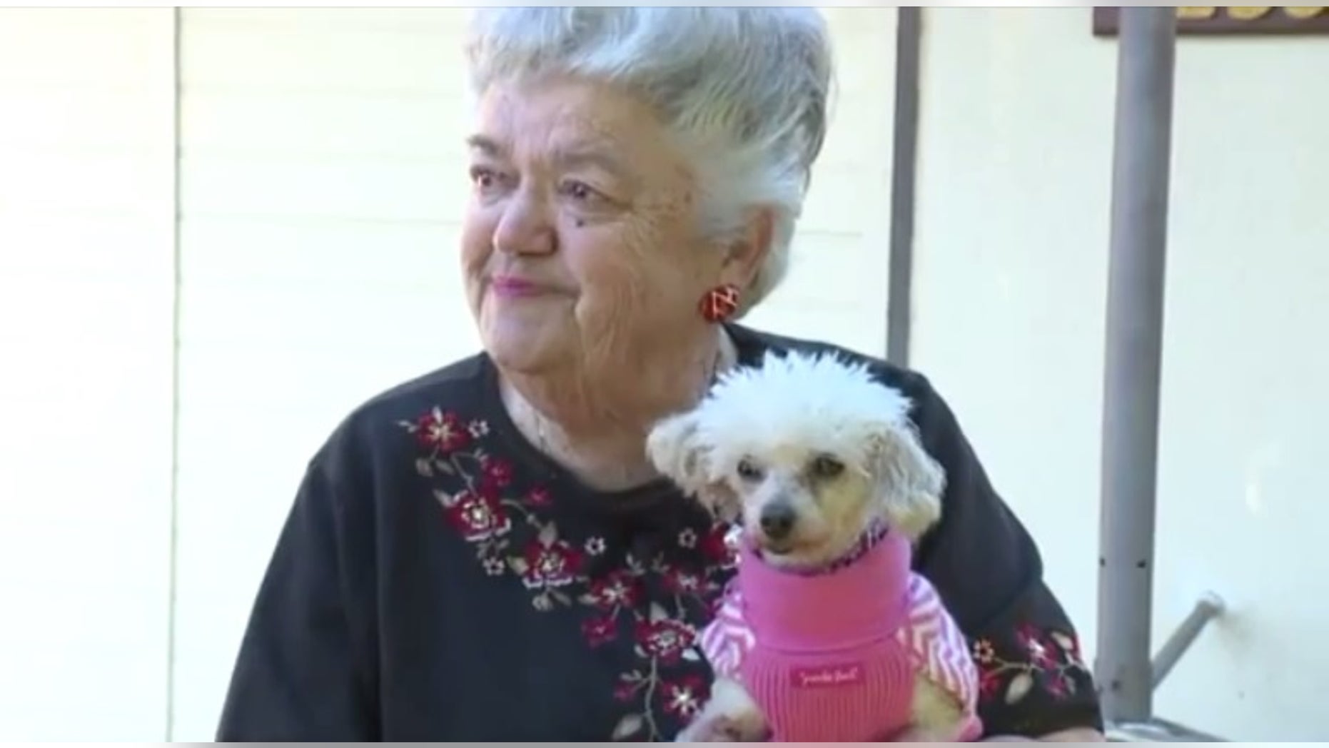 Sally Butters and her dog, Gigi.