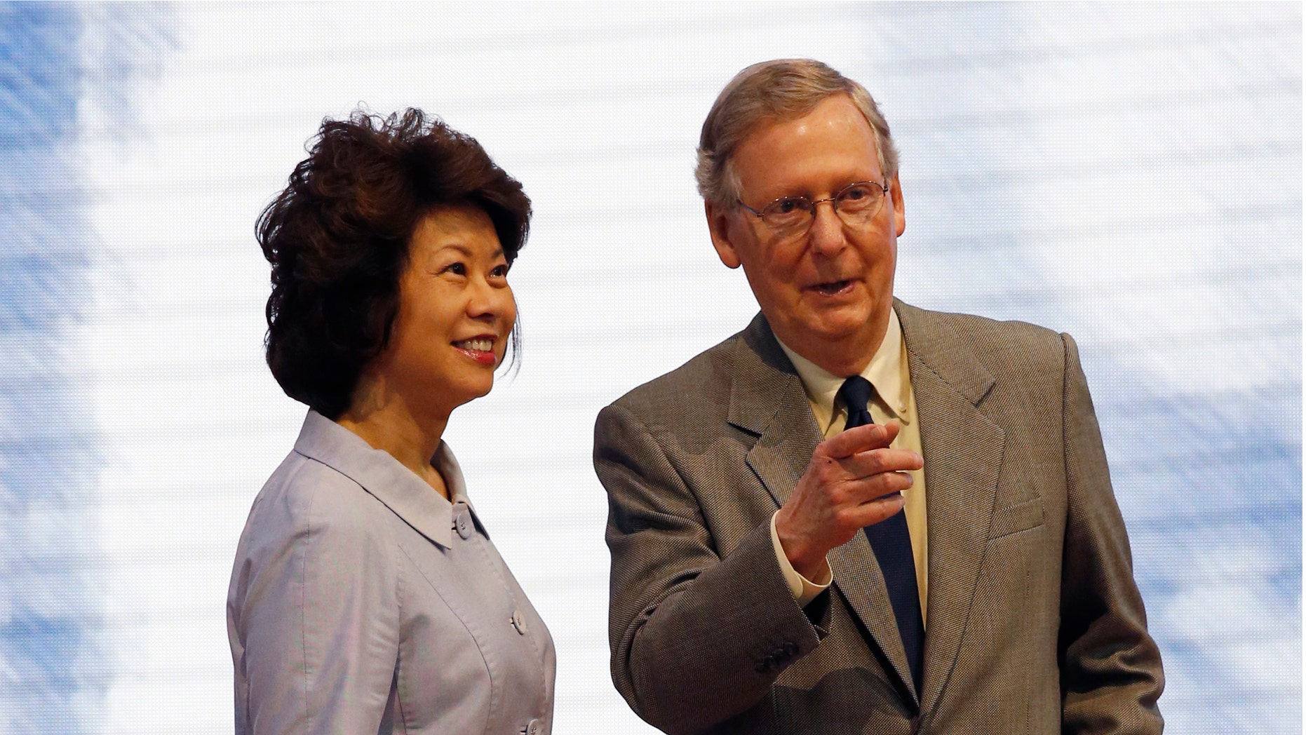FILE: Senate Minority Leader Mitch McConnell, R-Ky., and his wife, former Labor Secretary Elaine Chao at the Republican National Convention in Tampa, Fla.