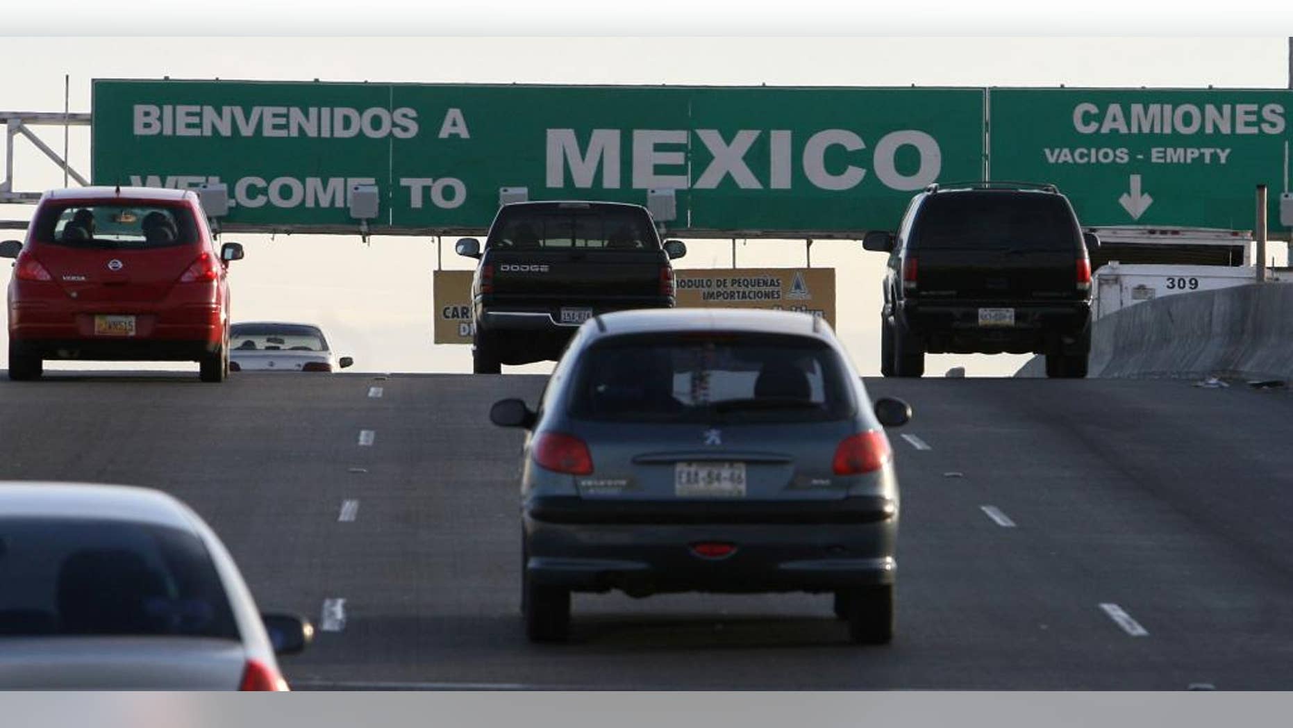 FILE - This Jan. 17, 2008 file photo, South bound vehicles leave El Paso, Texas and enter Juarez, Mexico at the Bridge of the Americas international port of entry. Immigrant advocates are complaining about U.S. Customs and Border Protection officers' actions toward residents along the U.S.-Mexico border in El Paso and New Mexico. A coalition of advocacy groups said Tuesday, May 17, 2016, that they filed a complaint with the U.S. Department of Homeland Security alleging at least 13 residents have experienced abuse, including being falsely accused of being prostitutes to having legal document seized for no reason. (Rudy Gutierrez/El Paso Times via AP, File) OUT EL PASO, EL DIARIO OUT, JUAREZ, MEXICO, EL DIARIO DE EL PASO OUT
