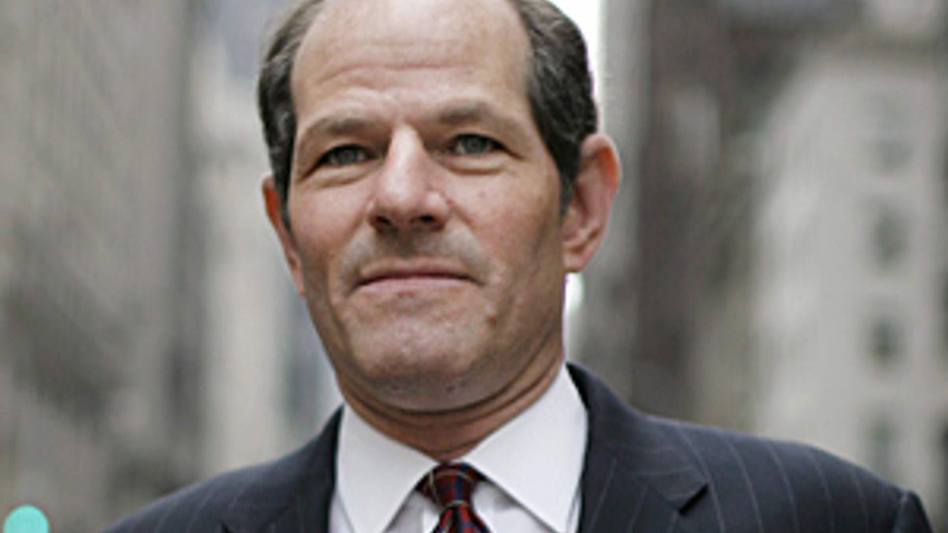 NEW YORK - APRIL 7: "EXCLUSIVE" Former New York Governor and Attorney General Eliot Spitzer works at the family firm started by his father Bernard Spitzer on 5th Avenue and goes about his business on the streets of New York on April 10, 2009 in New York, NY. On March 10, 2008, The New York Times reported that Spitzer was a client of a prostitution ring under investigation by the federal government. Two days later, he announced his resignation as governor of New York, effective March 17, citing "private failings". (Photo by Charles Ommanney/Getty Images)