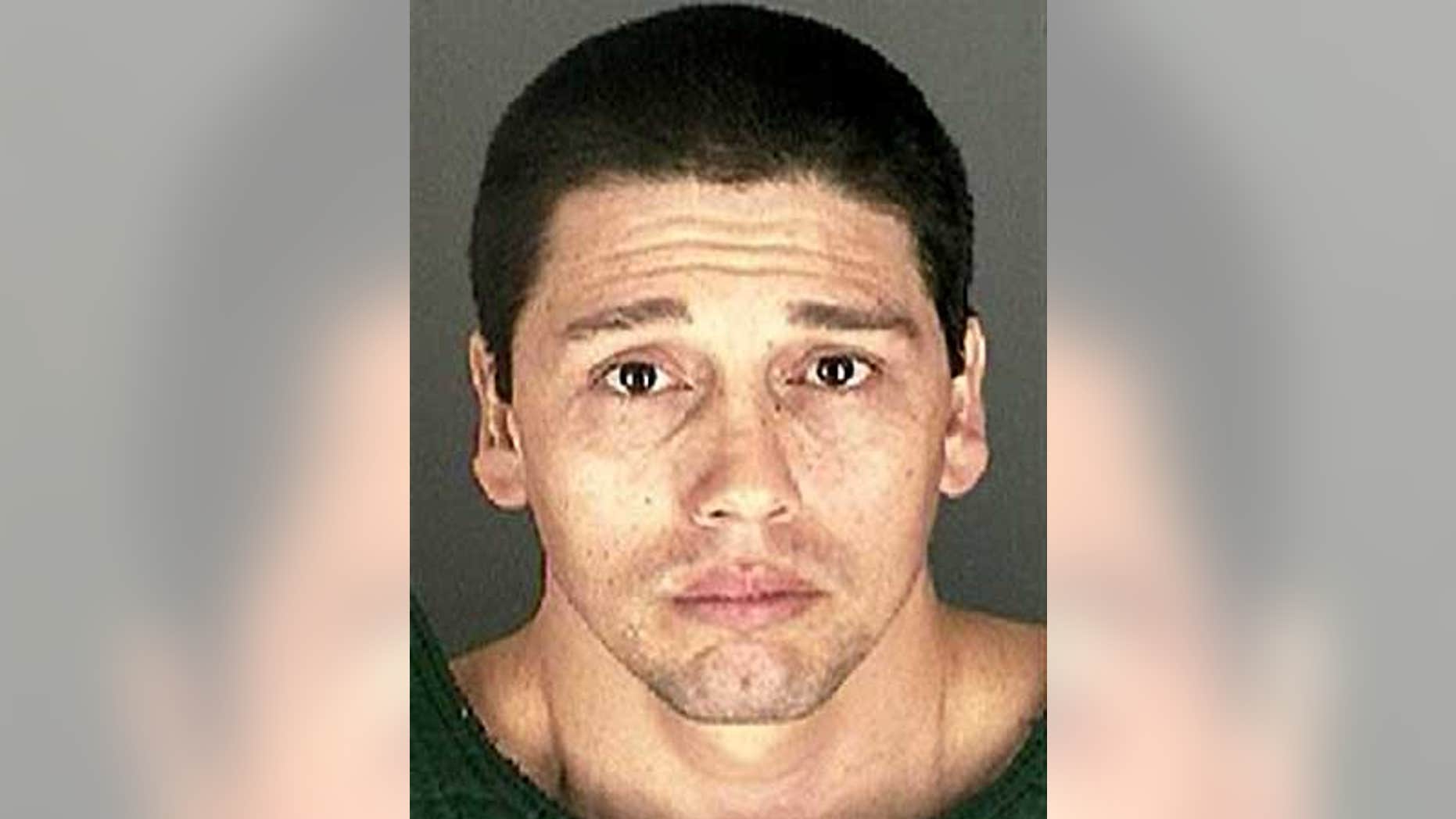 Booking photo of 38-year-old Diego Olmos-Alcalde.