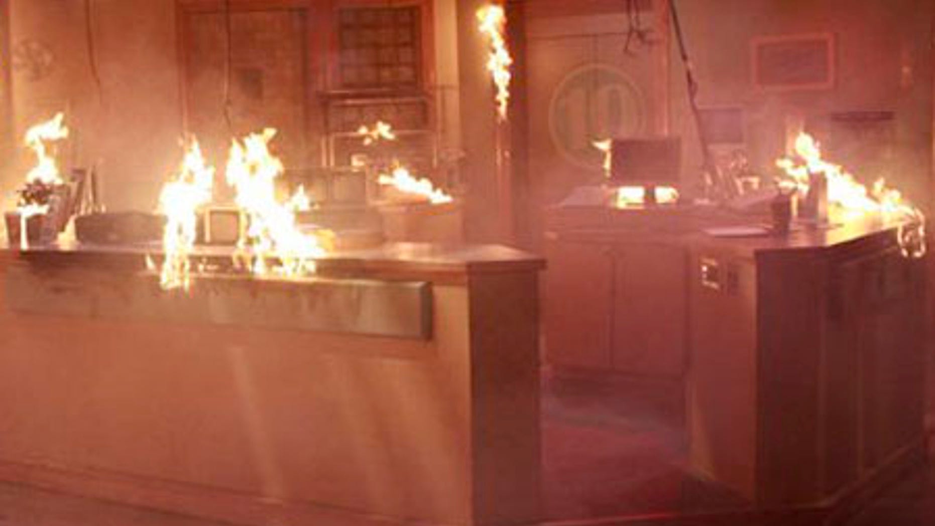 In this image released by ABC, the nurses hub set from the daytime series "General Hospital," is shown ablaze. After 45 years, the ABC daytime soap's long-standing hospital set is flatlining as part of an explosive storyline. Following a fiery crisis, the show's crew has ignited the clinical den of drama, and producers plan to construct a totally new interior. (AP Photo/ABC, Ron Tom) ** NO SALES **