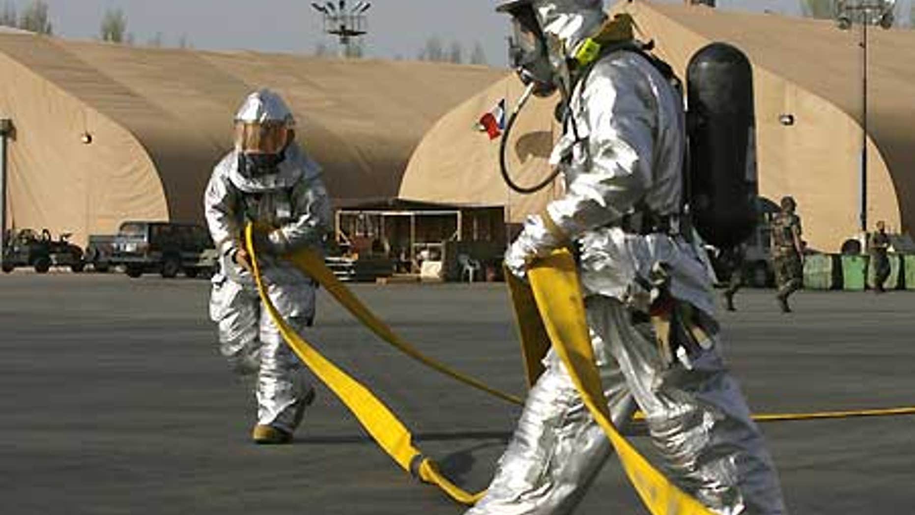 File: U.S. servicemen are seen during American-French joint exercises at the U.S. Manas Air Base, located near the Kyrgyz capital of Bishkek.