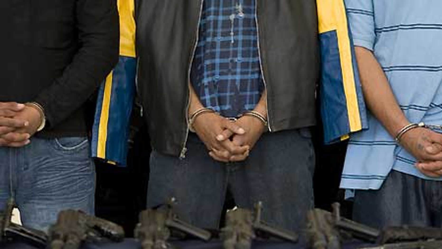 Feb. 12: Suspected members of a crime gang, allegedly extorting, kidnapping and drug trafficking in the outskirts of Mexico's capital.