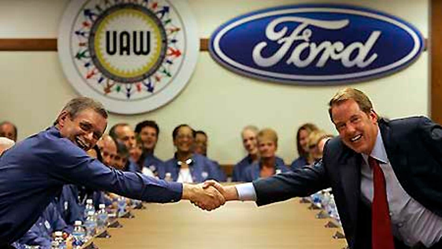 Ford Motor Co., Executive Chairman Bill Ford, right, will see the salary reductions this year and next.