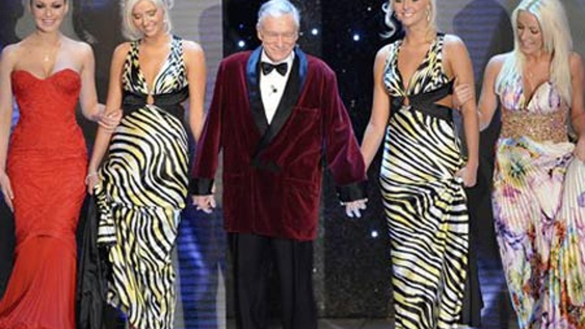 Feb. 20: Hugh Hefner arrives with his girlfriends at the "Festival di Sanremo" Italian song contest, in San Remo, Italy.