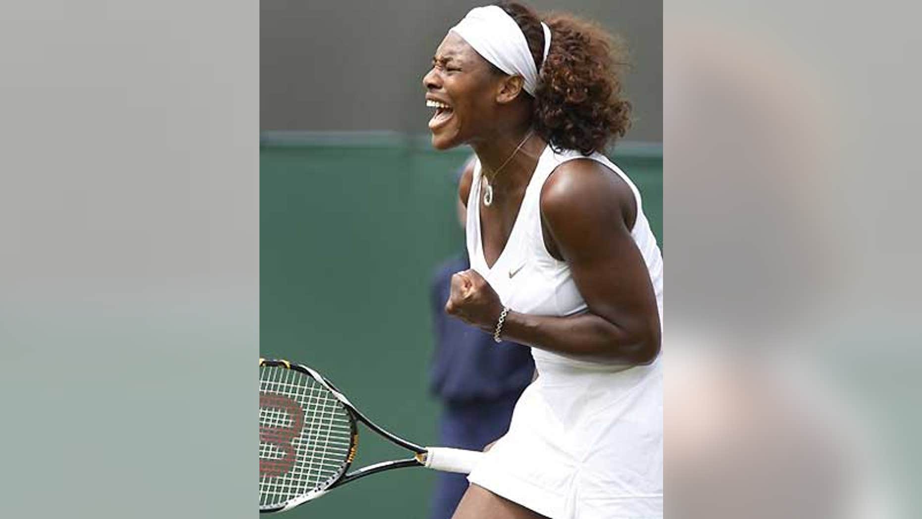 June 26: Serena Williams celebrates winning a point against Roberta Vinci of Italy during their third round singles match at Wimbledon, Friday.