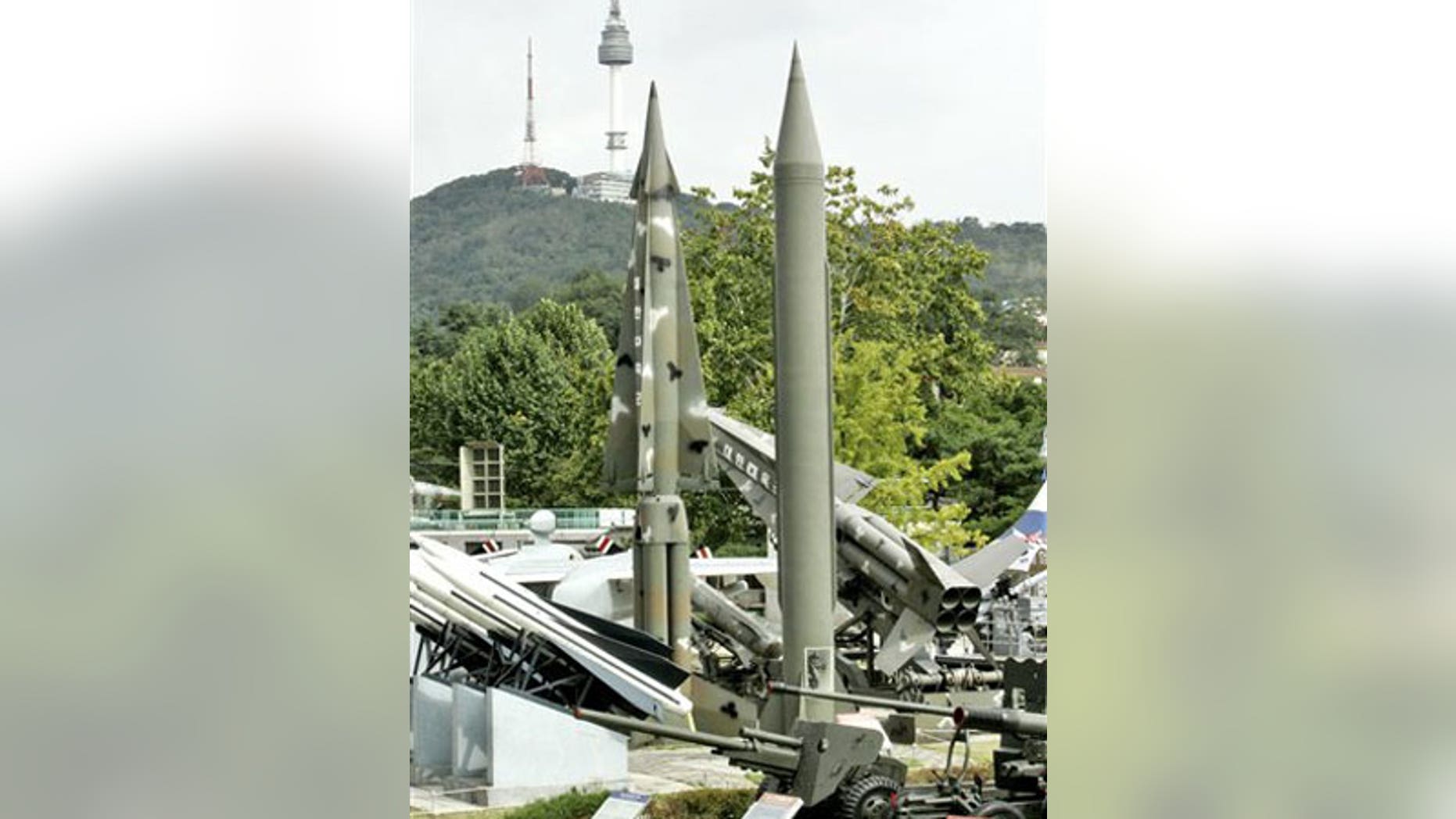 Oct. 8: A model of mock North Korea's Scud-B missile, center right in plain green, and other S. Korean missiles are displayed in Seoul, South Korea.
