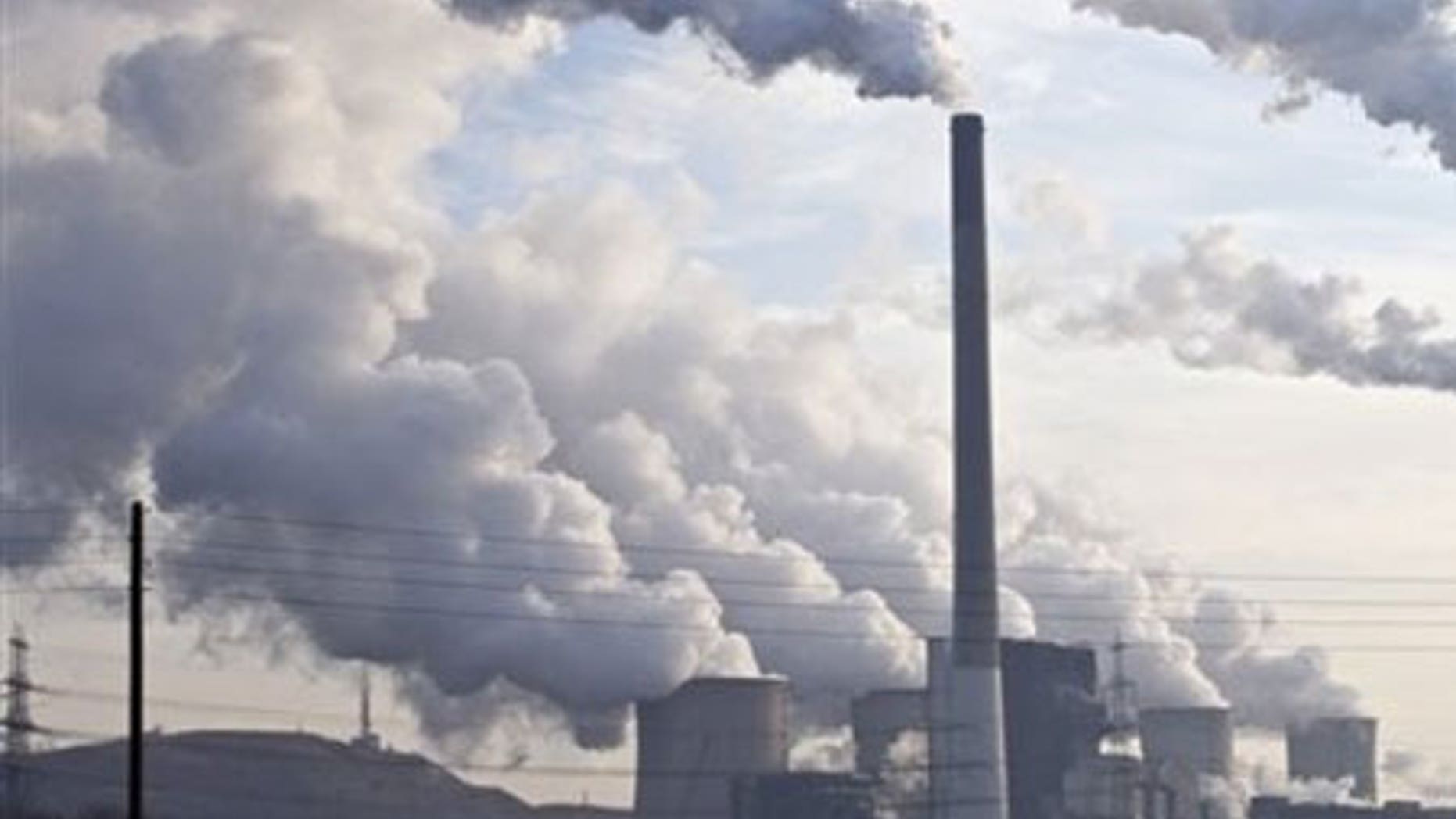 Dec. 16: Steam and smoke is seen over the coal burning power plant in Gelsenkirchen, Germany. Coal power plants are among the biggest producer of CO2.