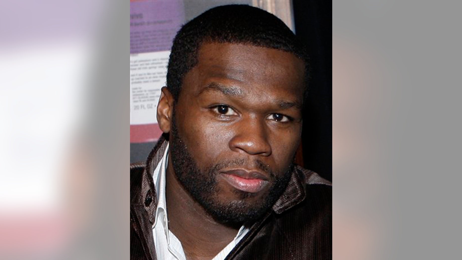** FILE ** In this Jan. 17, 2009 file photo, Curtis "50 Cent" Jackson poses before hosting a screening of the documentary film "Two Turntables and a Microphone" during the Sundance Film Festival in Park City, Utah. (AP Photo/Matt Sayles, file)