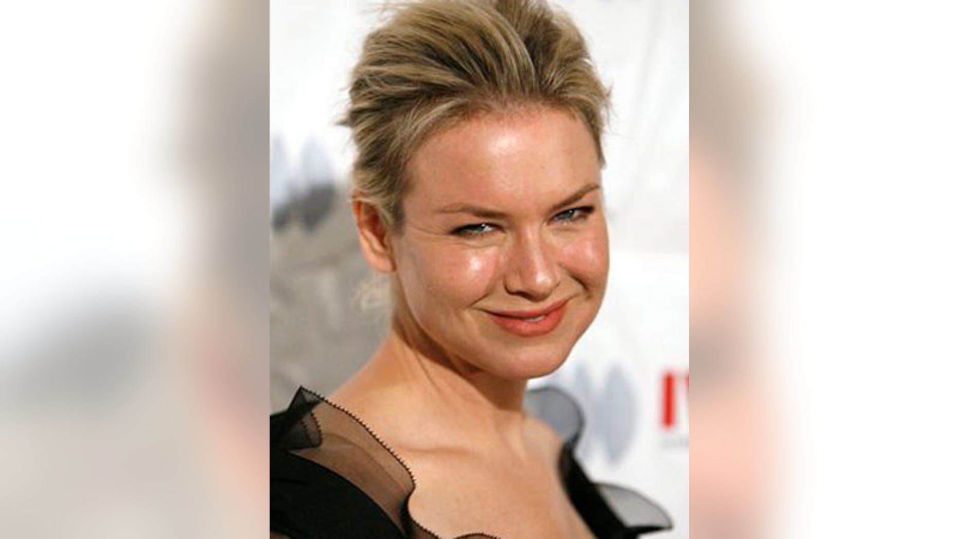 ** FILE ** In this Oct. 16, 2008 file photo, actress Renee Zellweger arrives at the International Women's Media Foundation's Courage in Journalism Awards in Beverly Hills, Calif. (AP Photo/Gus Ruelas, file)