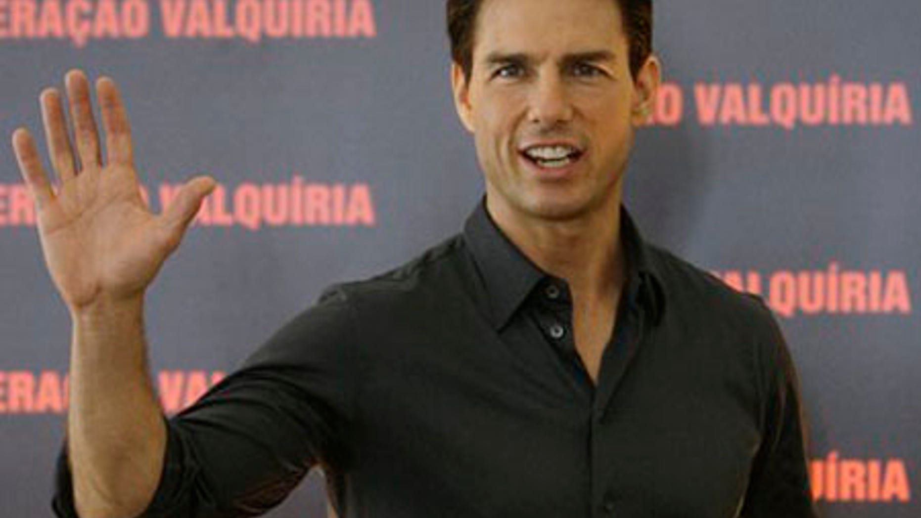 ** CORRECTS MONTH TO FEB. ** U.S. actor Tom Cruise waves during a photo call to promote his movie "Valkyrie" in Rio de Janeiro, Tuesday, Feb. 3, 2009. (AP Photo/Ricardo Moraes)