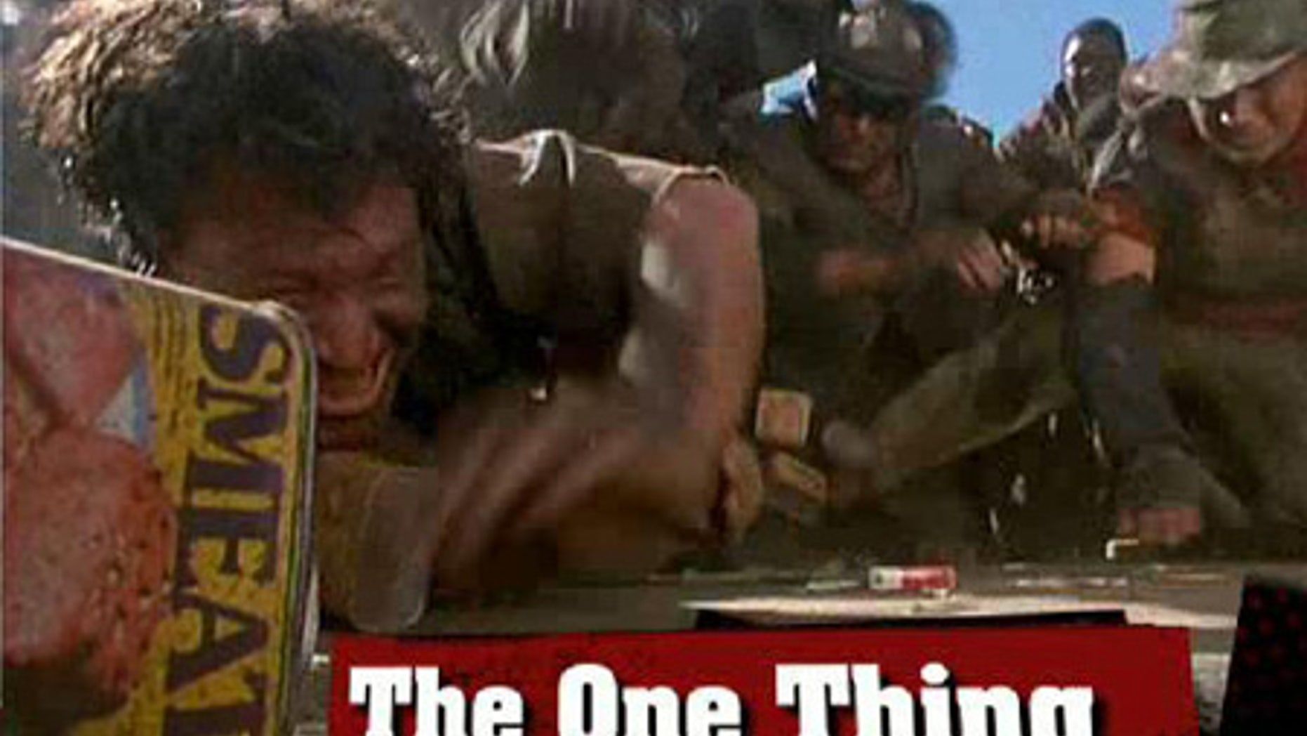 Is our government trying to buy us off like the people in this 'Waterworld' scene?