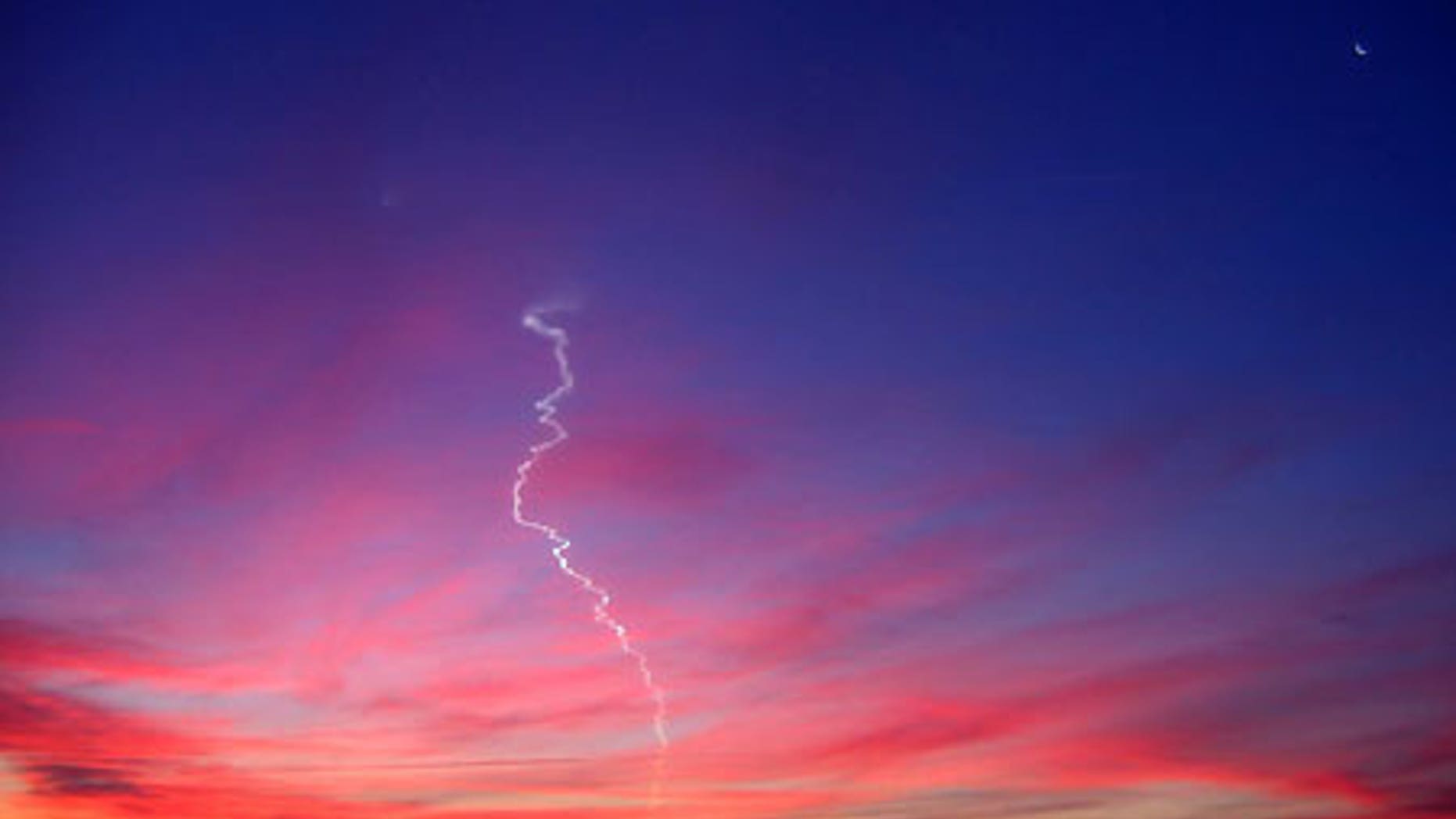 A Dec. 2006 Minotaur rocket launch from Wallops Island, Va., as photographed by Geoff Chester in Alexandria, Va.