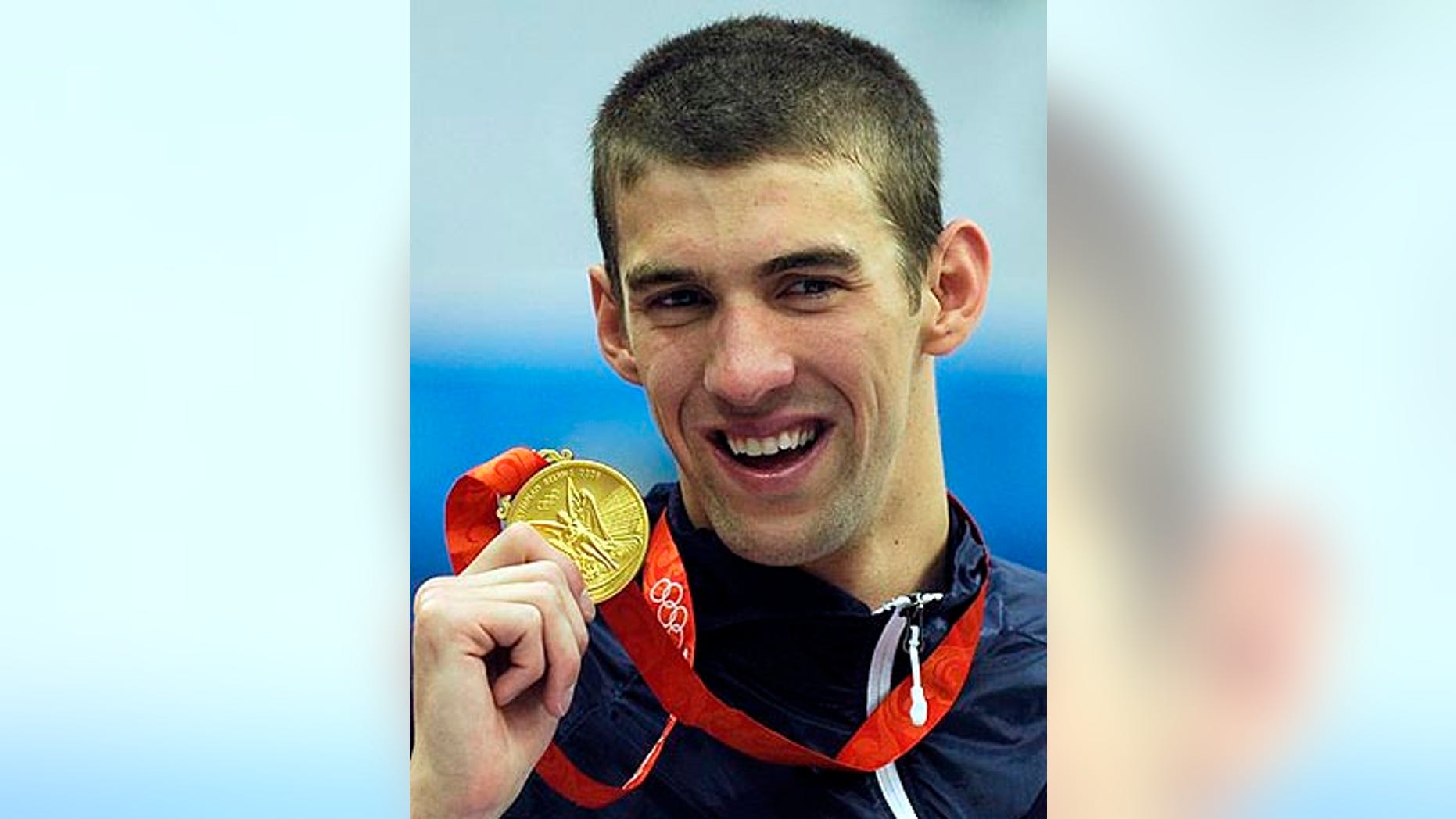 Aug. 17, 2008: Michael Phelps displays his eighth gold medal after the men's 4x100-meter medley relay final at the 2008 Olympic Games in Beijing.