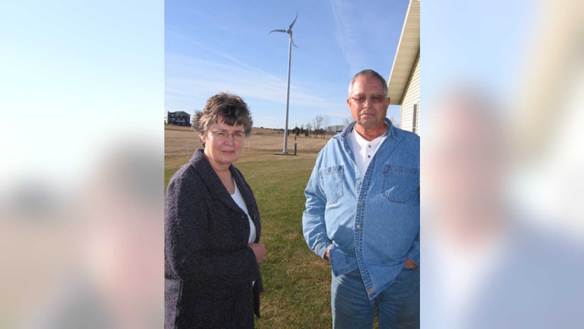 Jeanne and Larry Walth, of Wishek, N.D., save roughly $50 monthly using the wind turbine city officials say must come down.