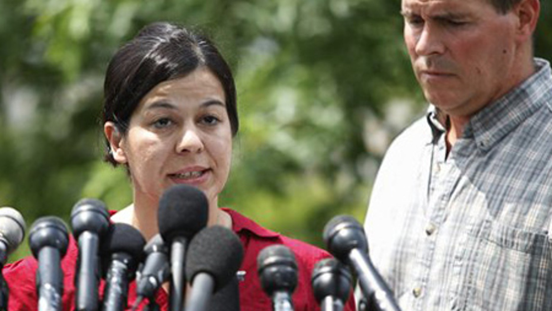 July 29: Lucia Whalen speaks during a media availability in Cambridge, Mass., alongside her husband.