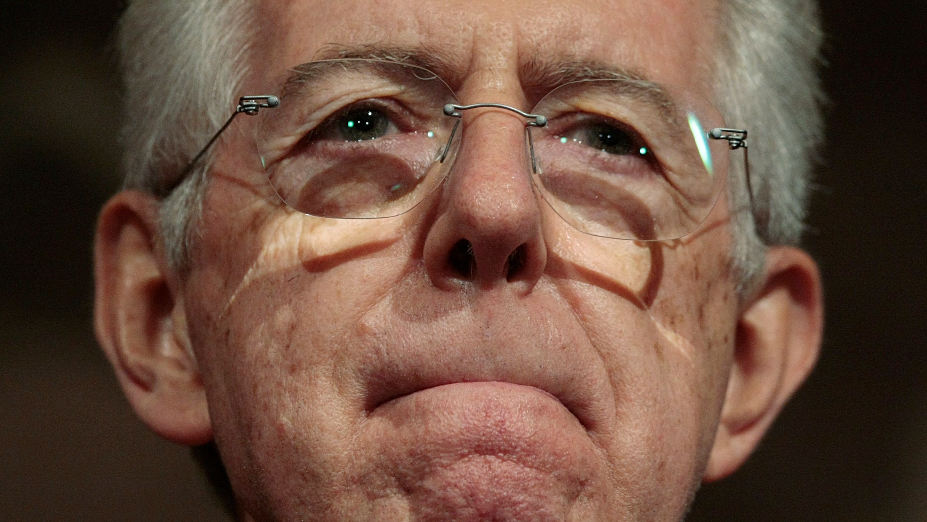 Nov. 15, 2011: Italy's premier-designate Mario Monti speaks to the media after finishing his meetings with Italian political leaders and organizations' representatives at the Senate, in Rome.
