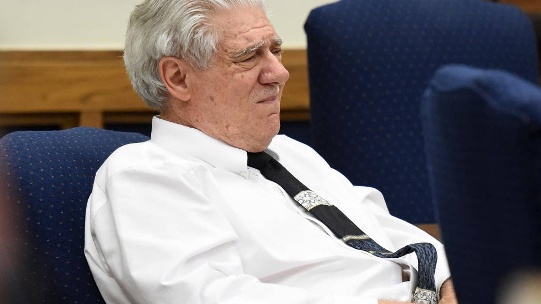 FILE - In this Wednesday, May 27, 2015 file photo, Wayne Burgarello listens as a witness takes the stand at the Washoe County District Court, in Reno, Nev. A Nevada prosecutor on Friday, May 29, urged jurors to convict Burgarello of first-degree murder, saying he was seeking out a deadly confrontation when he shot two unarmed trespassers in a vacant duplex he owns. Burgarello maintains he was acting in self-defense when he killed Cody Devine and seriously wounded Janai Wilson last year. A jury in Reno is expected to begin deliberations Friday afternoon. (Andy Barron/The Reno Gazette-Journal via AP, Pool,File)