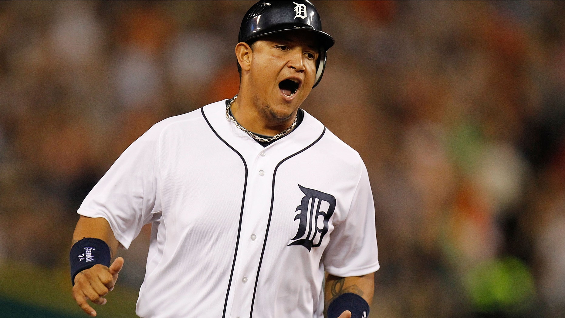 DETROIT, MI - SEPTEMBER 02: Miguel Cabrera #24 of the Detroit Tigers reacts to a sixth inning home run by Delmon Young #21 while playing the Chicago White Sox at Comerica Park on September 2, 2012 in Detroit, Michigan. (Photo by Gregory Shamus/Getty Images)