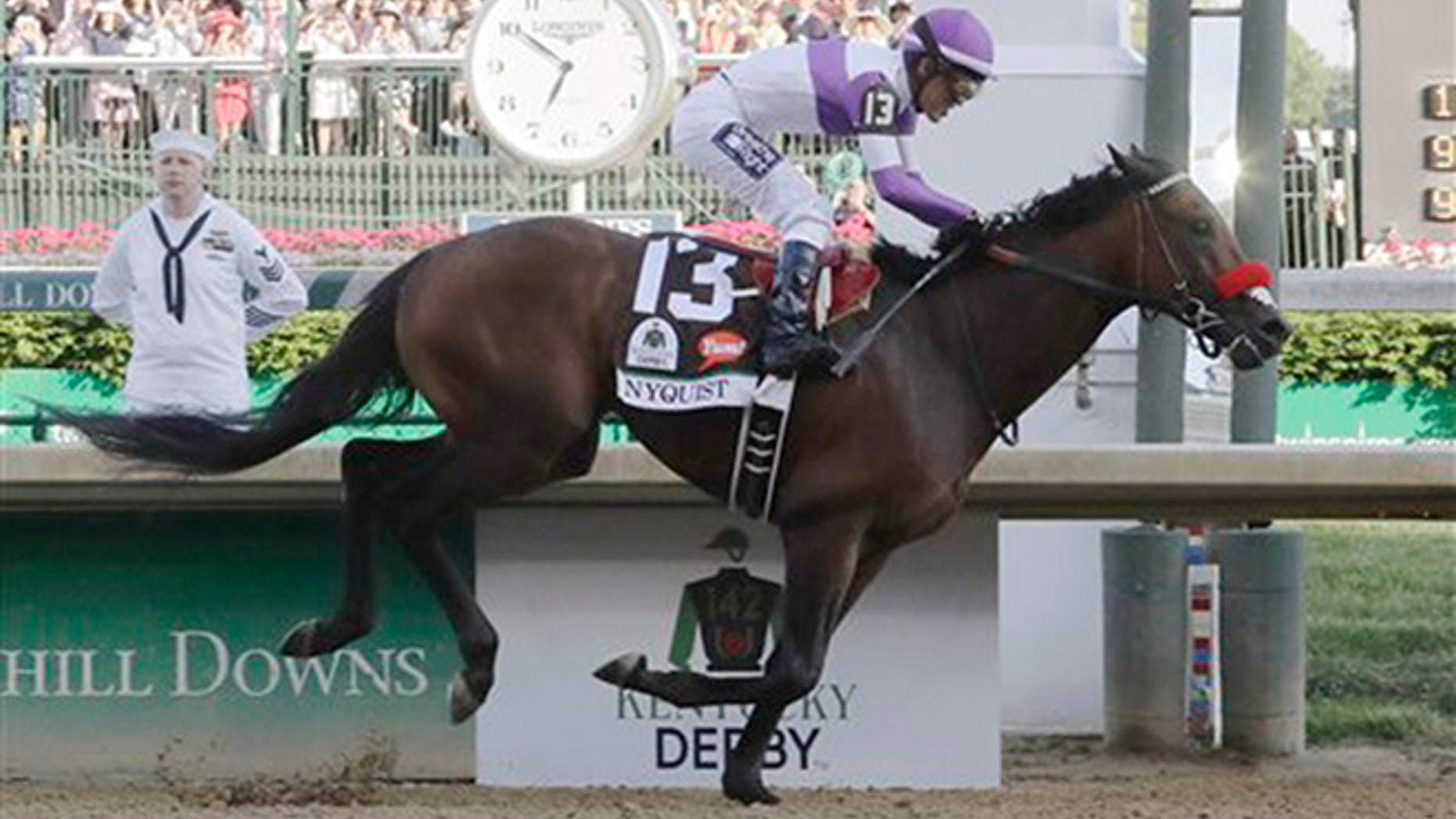 Mario Guitierrez rides Nyquist to victory during the 142nd running of the Kentucky Derby horse race at Churchill Downs Saturday, May 7, 2016, in Louisville, Ky. (AP Photo/Morry Gash)