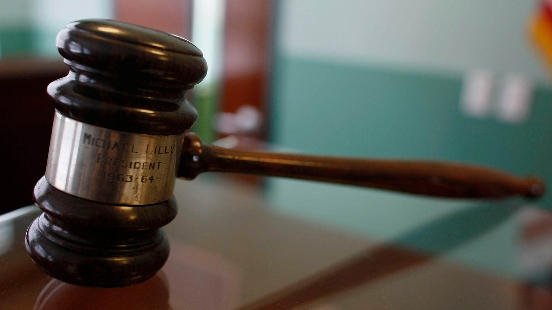 MIAMI - FEBRUARY 02: A judges gavel rests on top of a desk in the courtroom of the newly opened Black Police Precinct and Courthouse Museum February 3, 2009 in Miami, Florida. The museum is located in the only known structure in the nation that was designed, devoted to and operated as a separate station house and municipal court for African-Americans. In September 1944, the first black patrolmen were sworn in as emergency policemen to enforce the law in what was then called the "Central Negro District." The precinct building opened in May 1950 to provide a station house for the black policemen and a courtroom for black judges in which to adjudicate black defendants. The building operated from 1950 until its closing in 1963. (Photo by Joe Raedle/Getty Images)