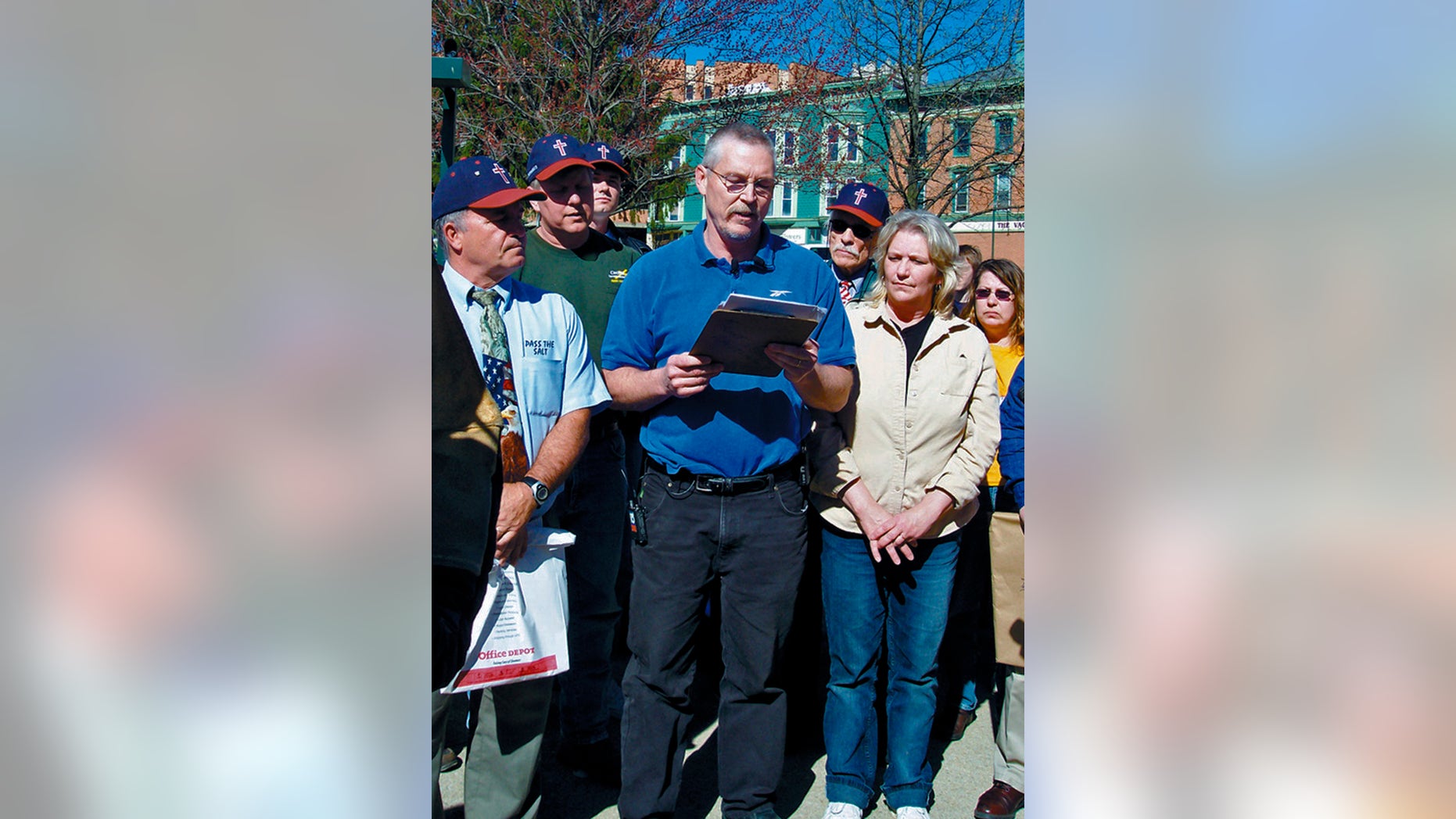 FILE - In this April 16, 2008 file photo, John Freshwater, center, addresses a crowd on Mount Vernon's public square in Mount Vernon, Ohio. The Ohio Supreme Court is ready to hear arguments in the case of Freshwater, a fired public school science teacher who kept a bible on his desk and was accused of preaching religious beliefs in class. (AP Photo/Mount Vernon News, Pam Schehl, File)