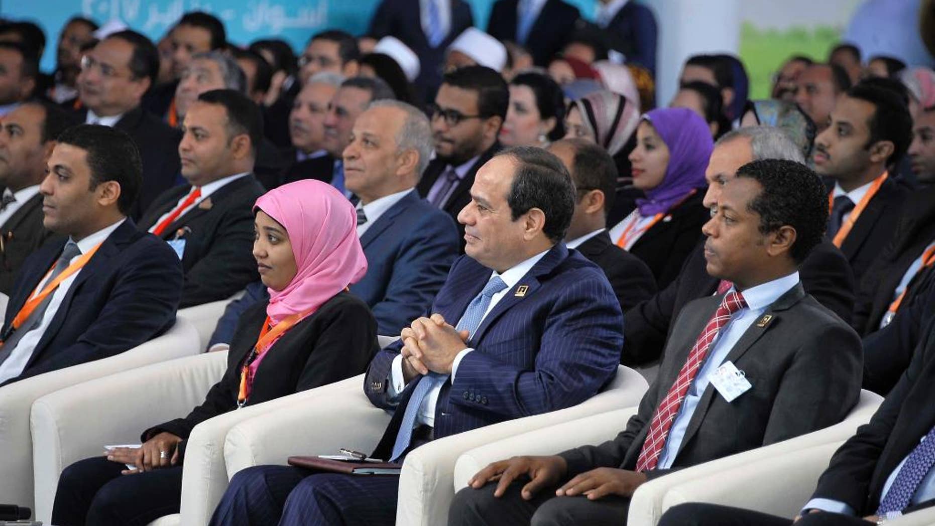 In this handout photo provided by the Egyptian presidency, President Abdel-Fattah el-Sissi, addresses a youth meeting in the southern city of Aswan on Saturday, Jan. 28, 2017. Egypt’s president has returned to some of his favorite topics, angrily denouncing the “evil people” plotting against his country and questioning the ideology of Islamic militants waging an insurgency against his government. (Egyptian presidency via AP)